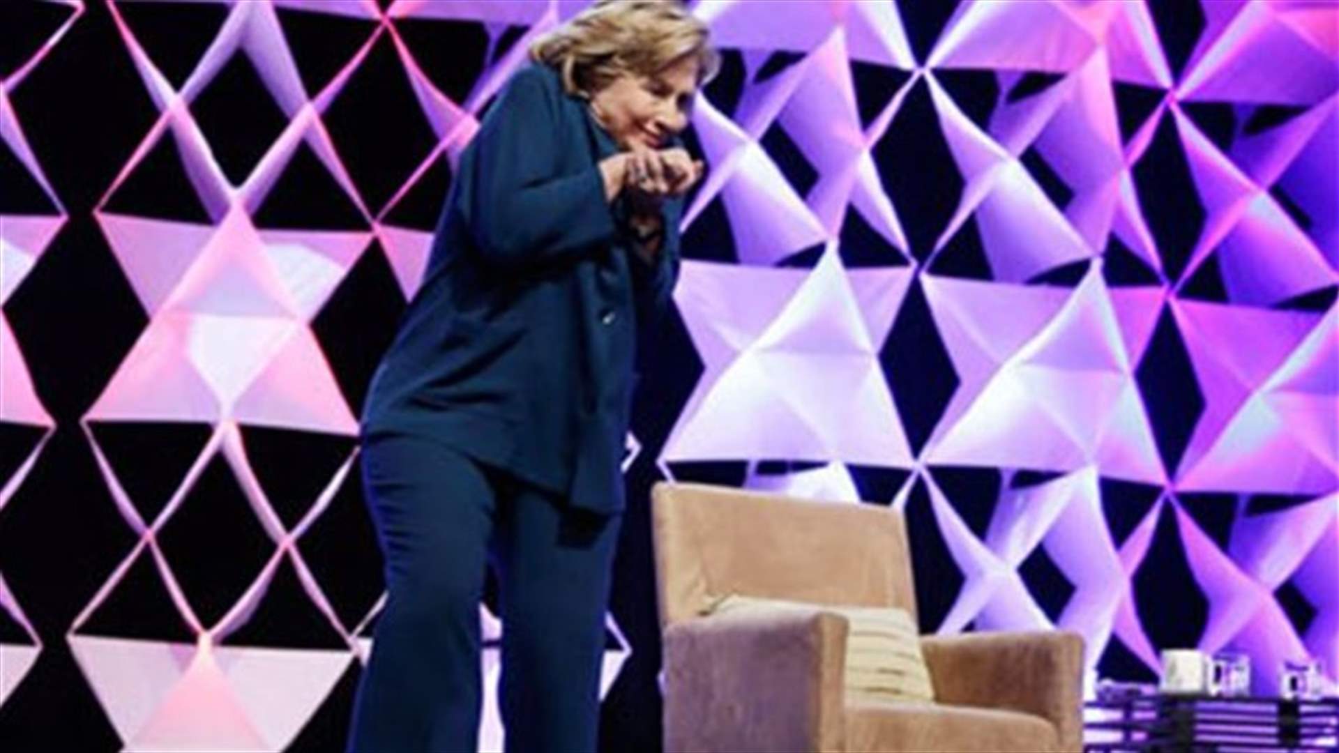 Woman accused of tossing shoe at Clinton released