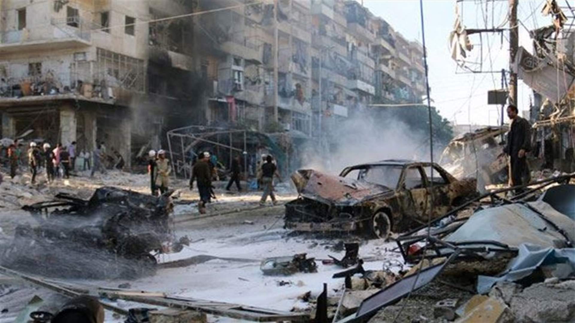 Car bombs in central Syria kill 18 - state TV 