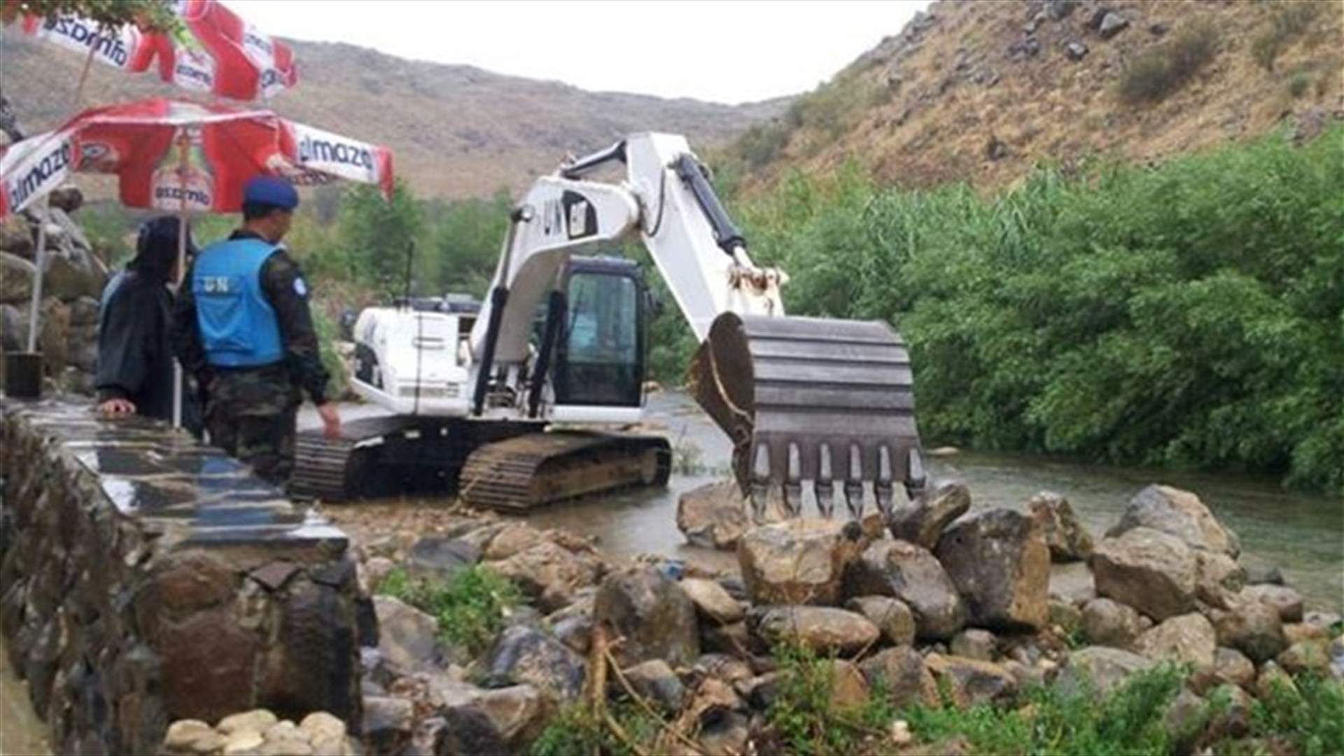 تنظيف مجرى نهر الوزاني رغم الامطار الغزيرة