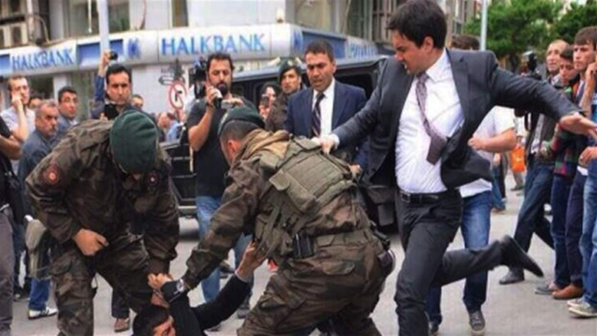 Turkish PM's aide who kicked protester sacked - official 
