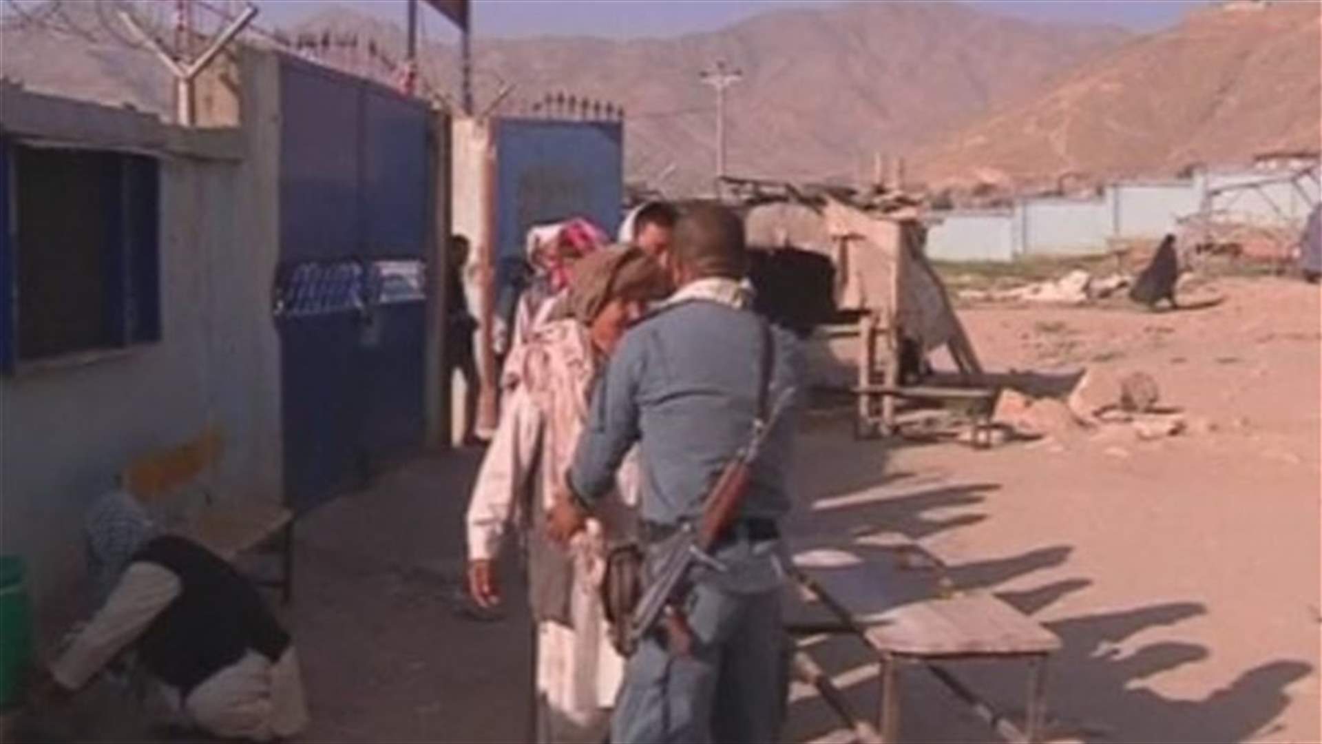 Afghans ignore Taliban threats and vote again in final test