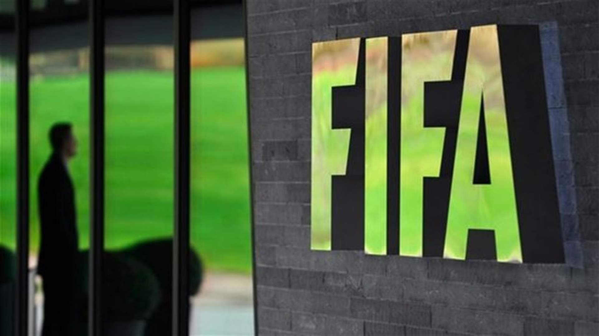 Protesters smear FIFA headquarters with paint