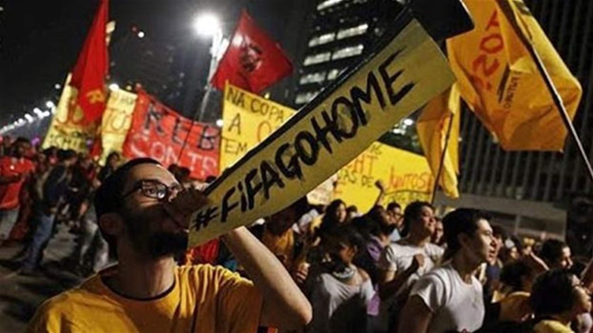 Police disperse protesters outside Brazil World Cup match