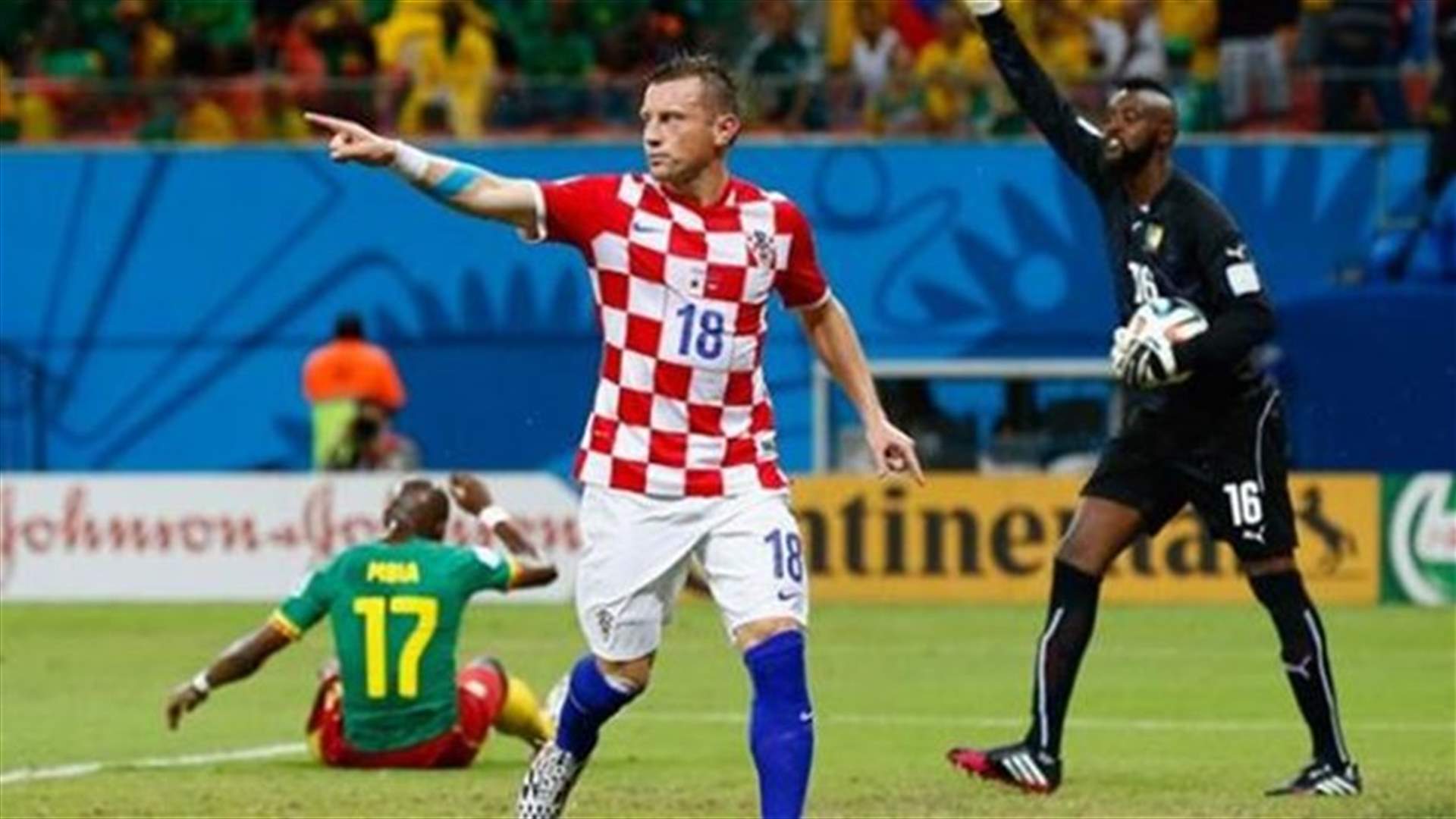 Soccer-Champions Spain out of World Cup, Dutch march on