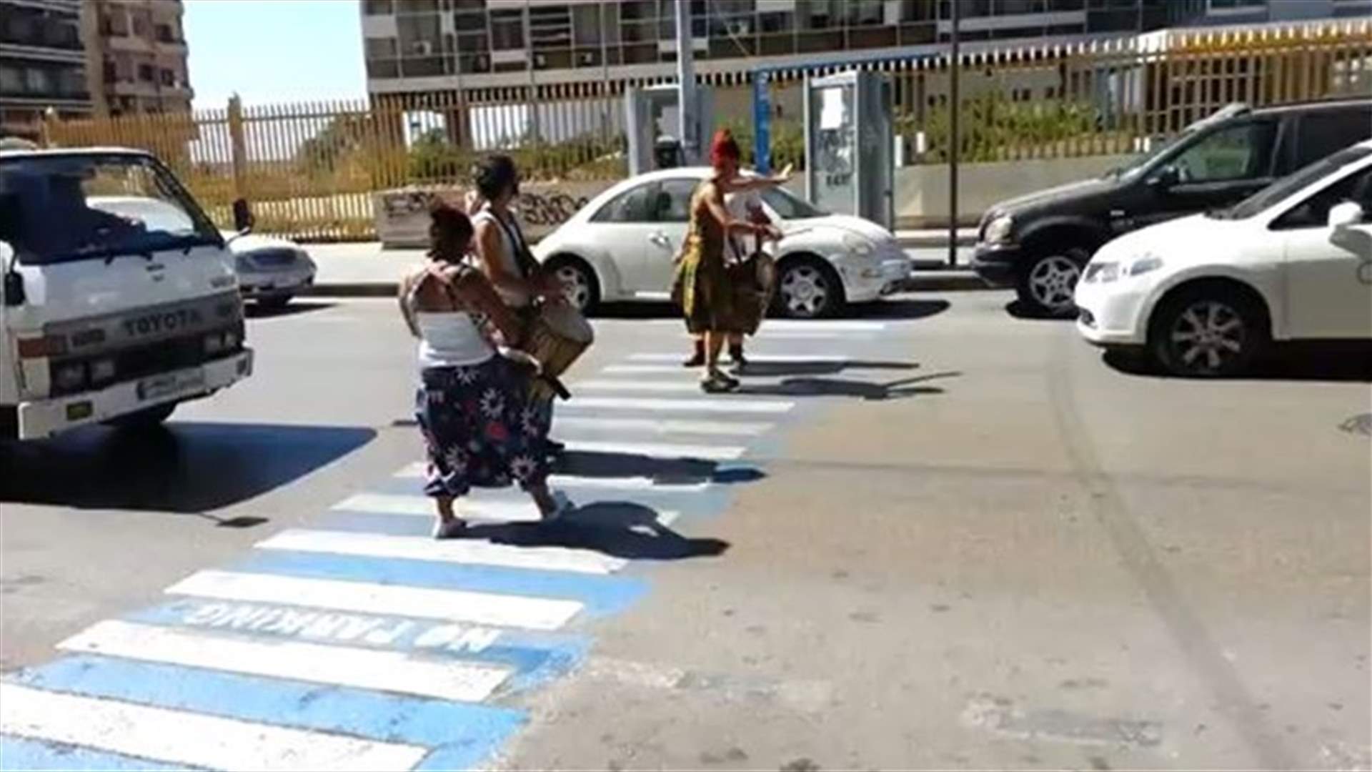 Beirut Drummers Beat Their Way Across Busy Traffic 