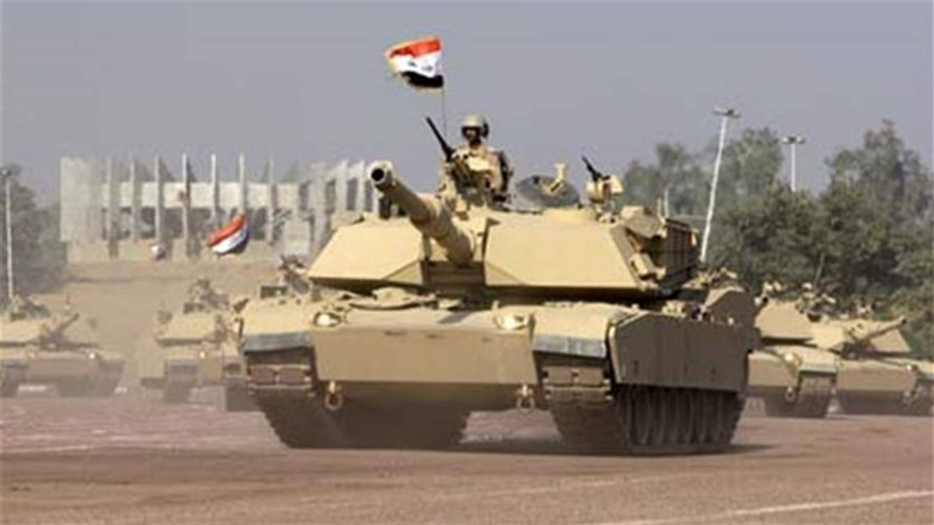 Iraqi troops push to retake Tikrit from rebels, parties pursue talks
