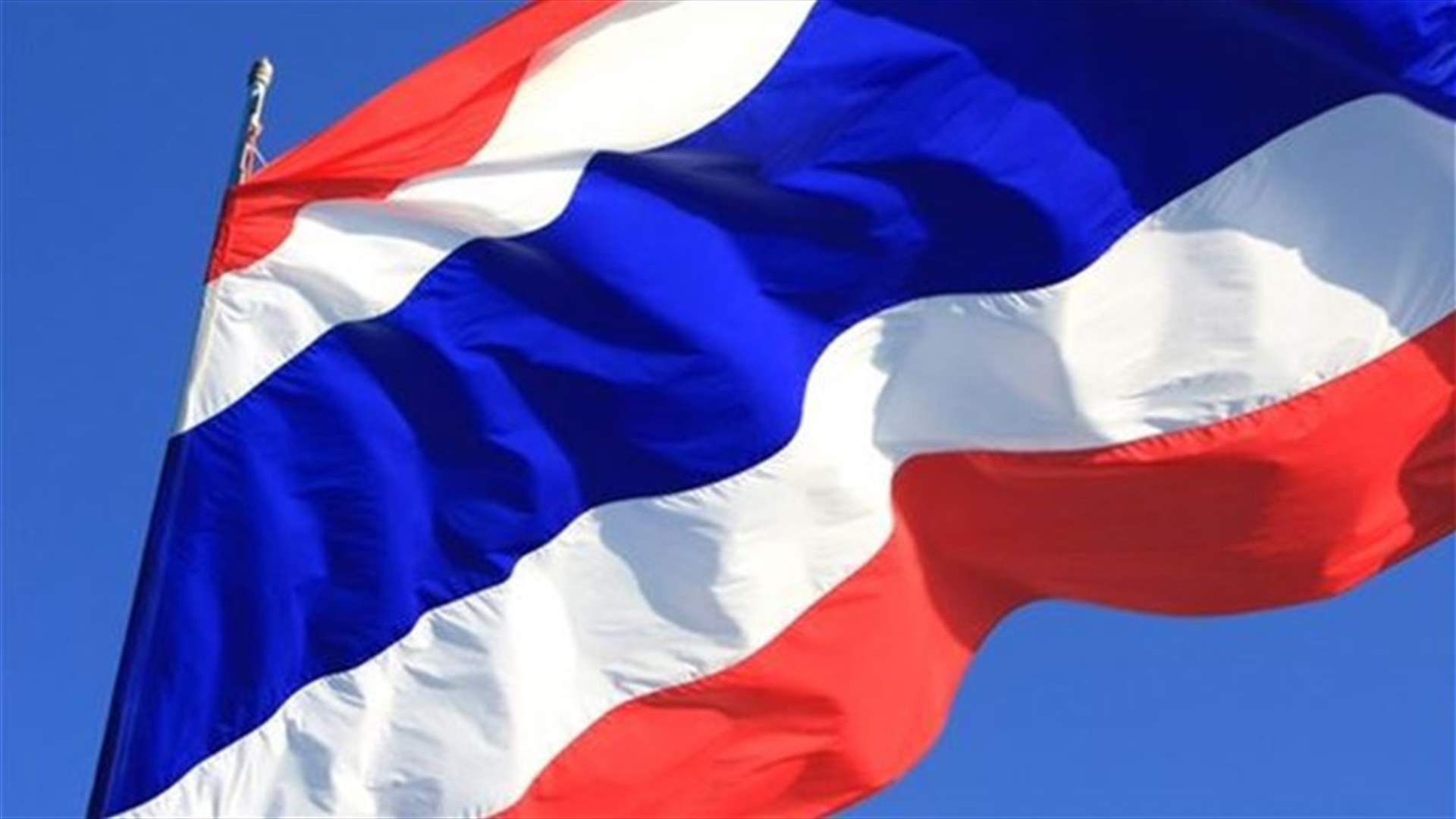 Former Thai PM returns home as legal threat lingers
