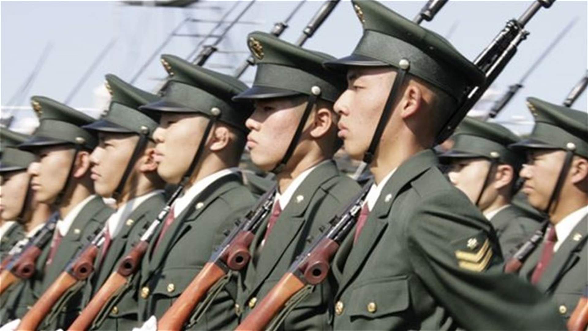 Japan takes historic step from post-war pacifism, OKs fighting for allies