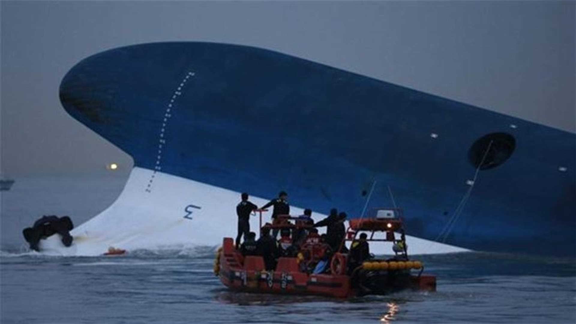 South Korea ferry fugitive hid behind cabin wall, bags of cash at hand