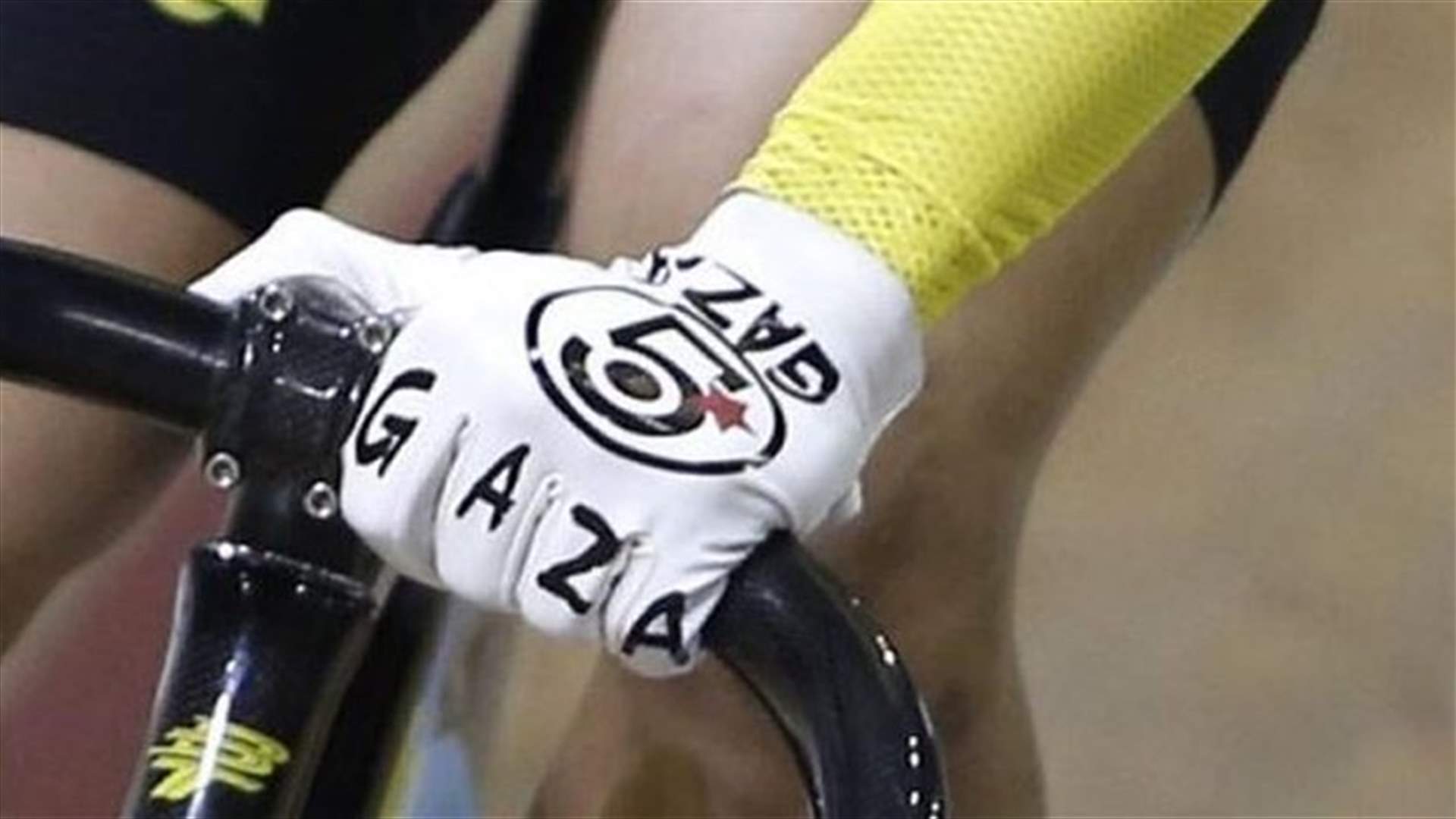 Malaysian cyclist reprimanded for Gaza protest