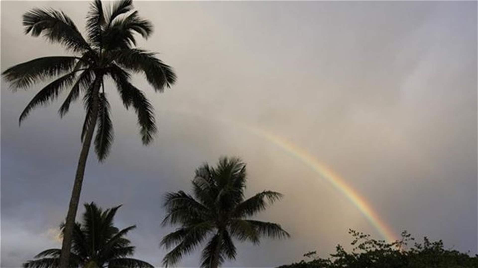 Hurricane, tropical storm roll toward Hawaii