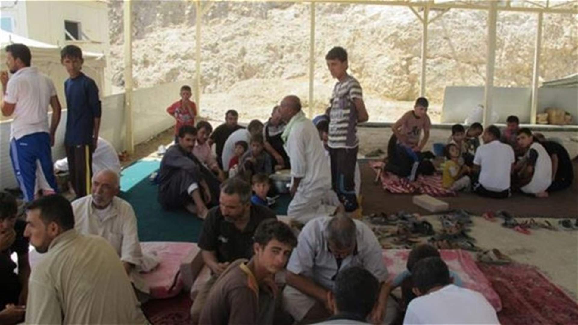 Officials say 80 Yazidis killed by militants in north