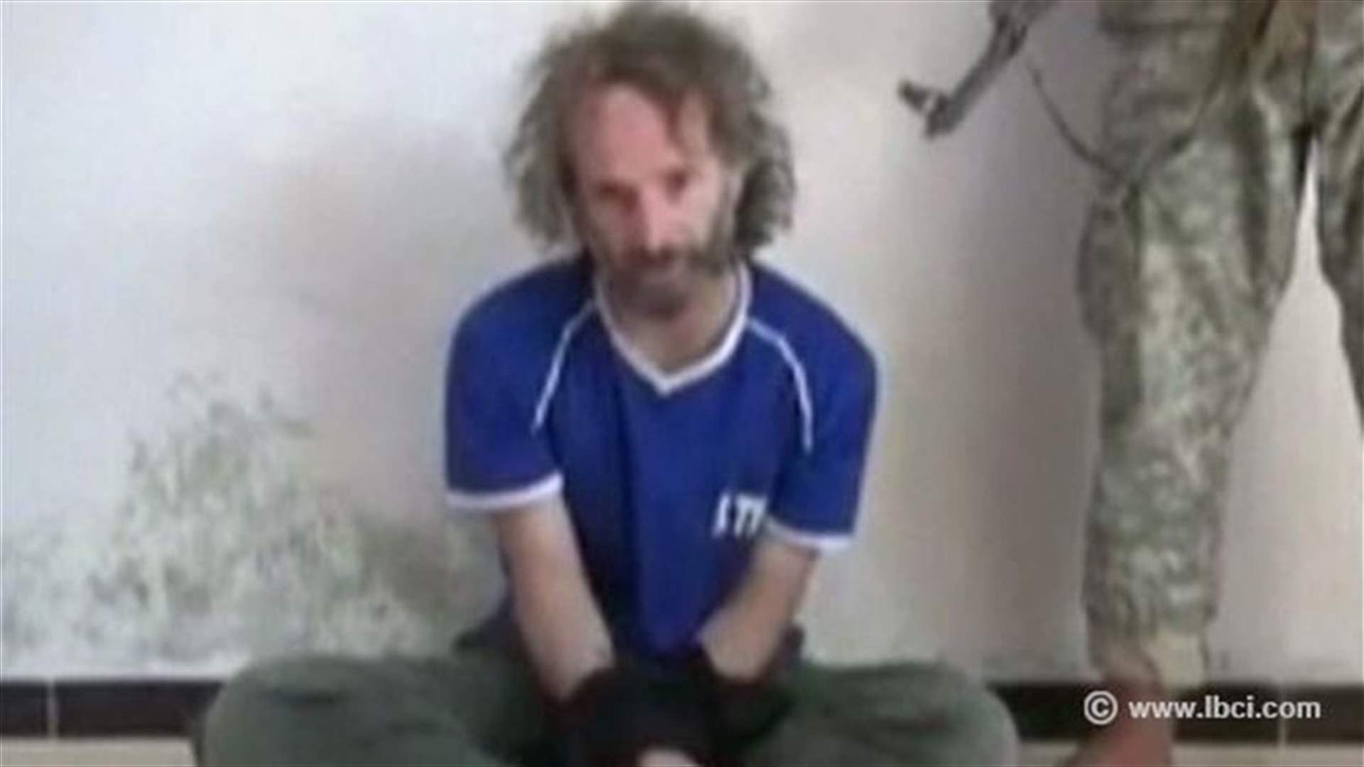 Released U.S. hostage says overwhelmed by welcome home