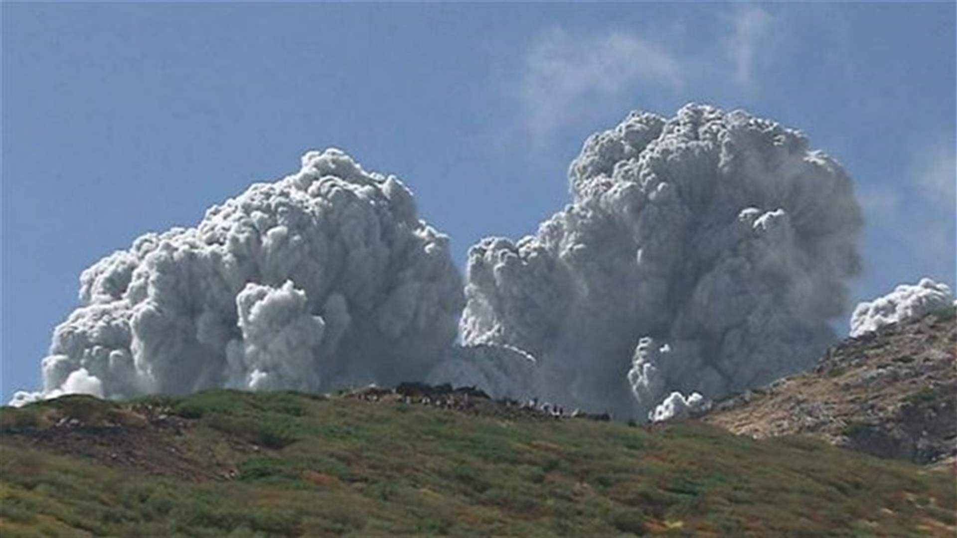 At least 36 feared dead on Japanese volcano, search called off