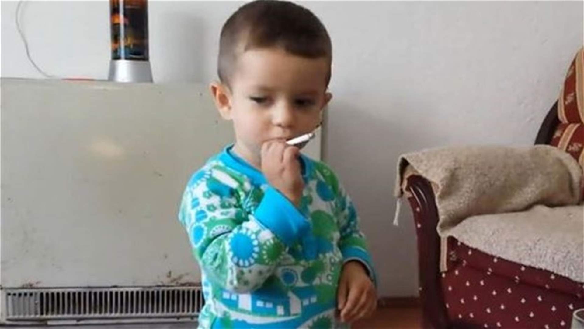 Cigarette Smoking Child Caught On Video!
