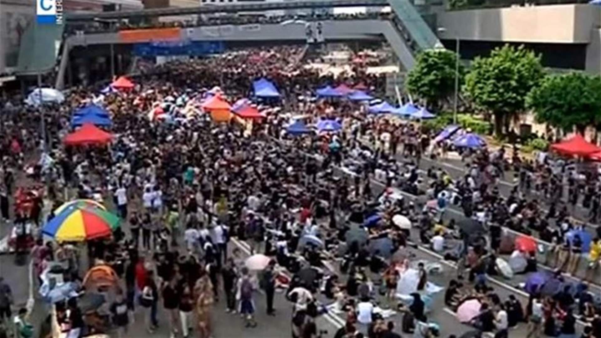 REPORT: Hong Kong warns democracy protesters of firm response