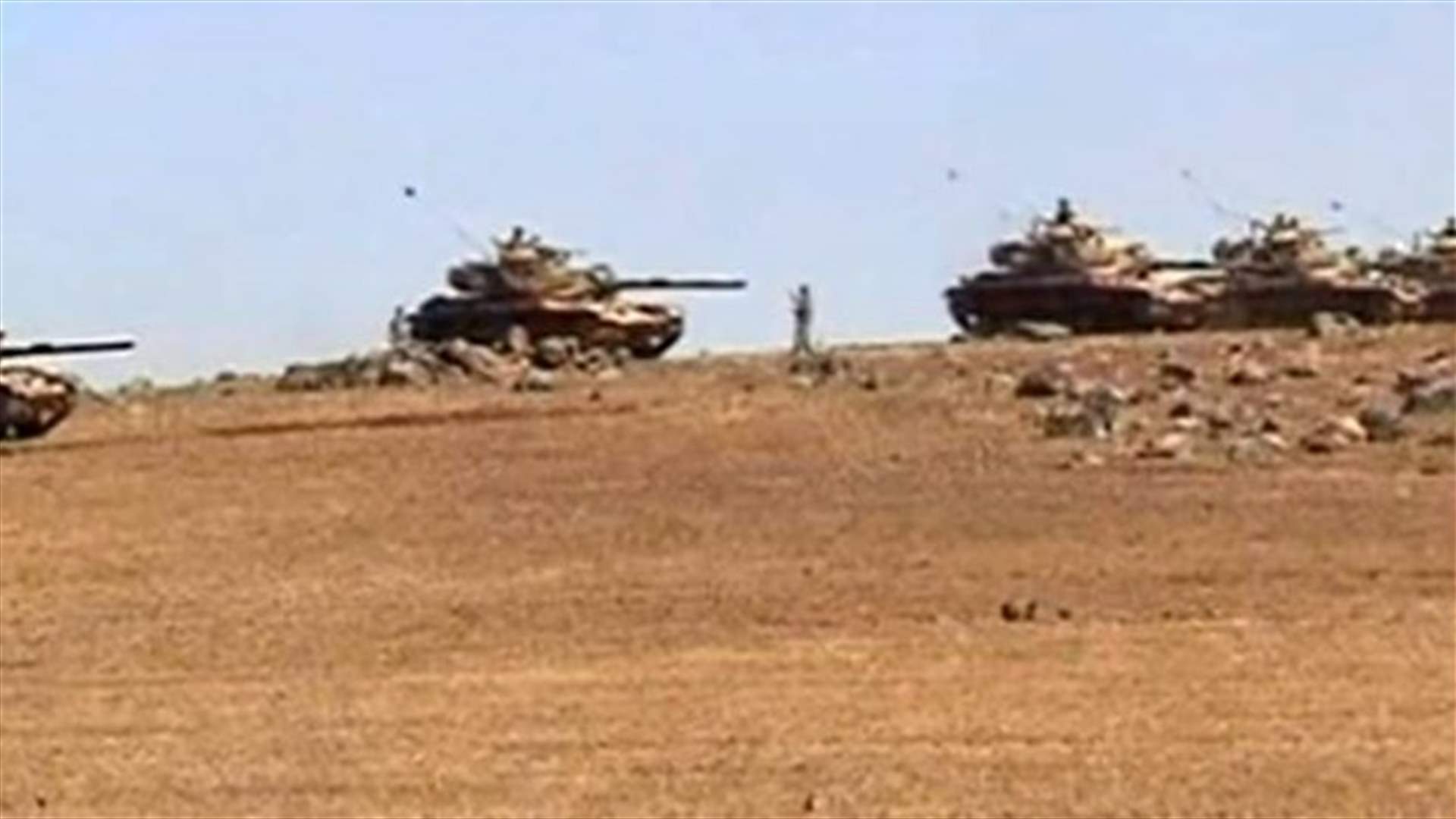 Kurds say air strikes push Islamic State back from Kobani