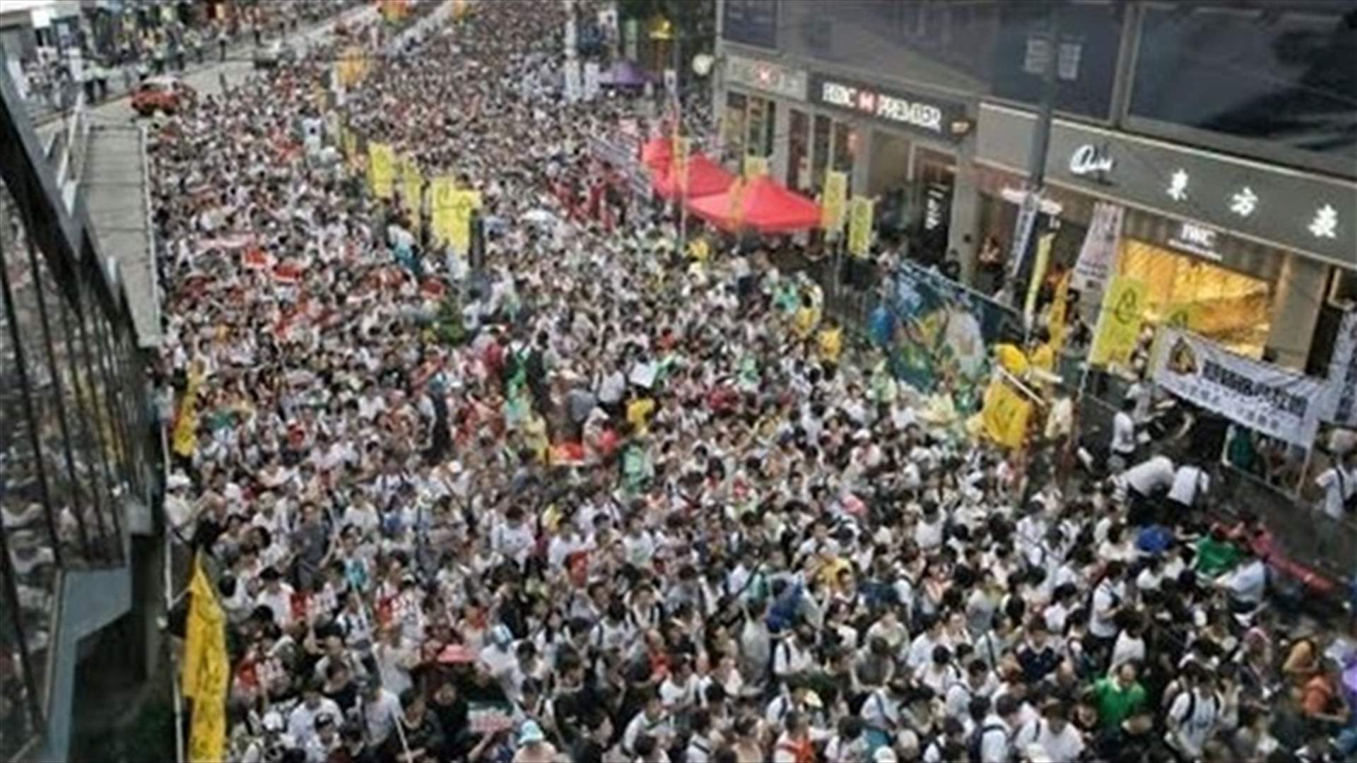 Scuffles break out in HK as anti-protest groups tear down barricades
