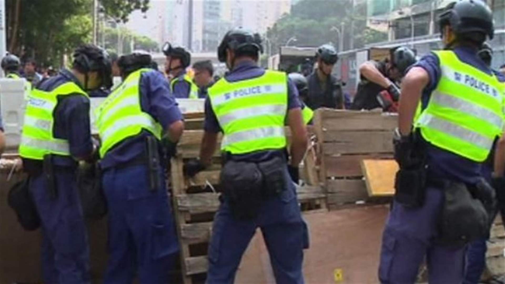 HK police use sledgehammers, chainsaws to clear protest barriers, open road