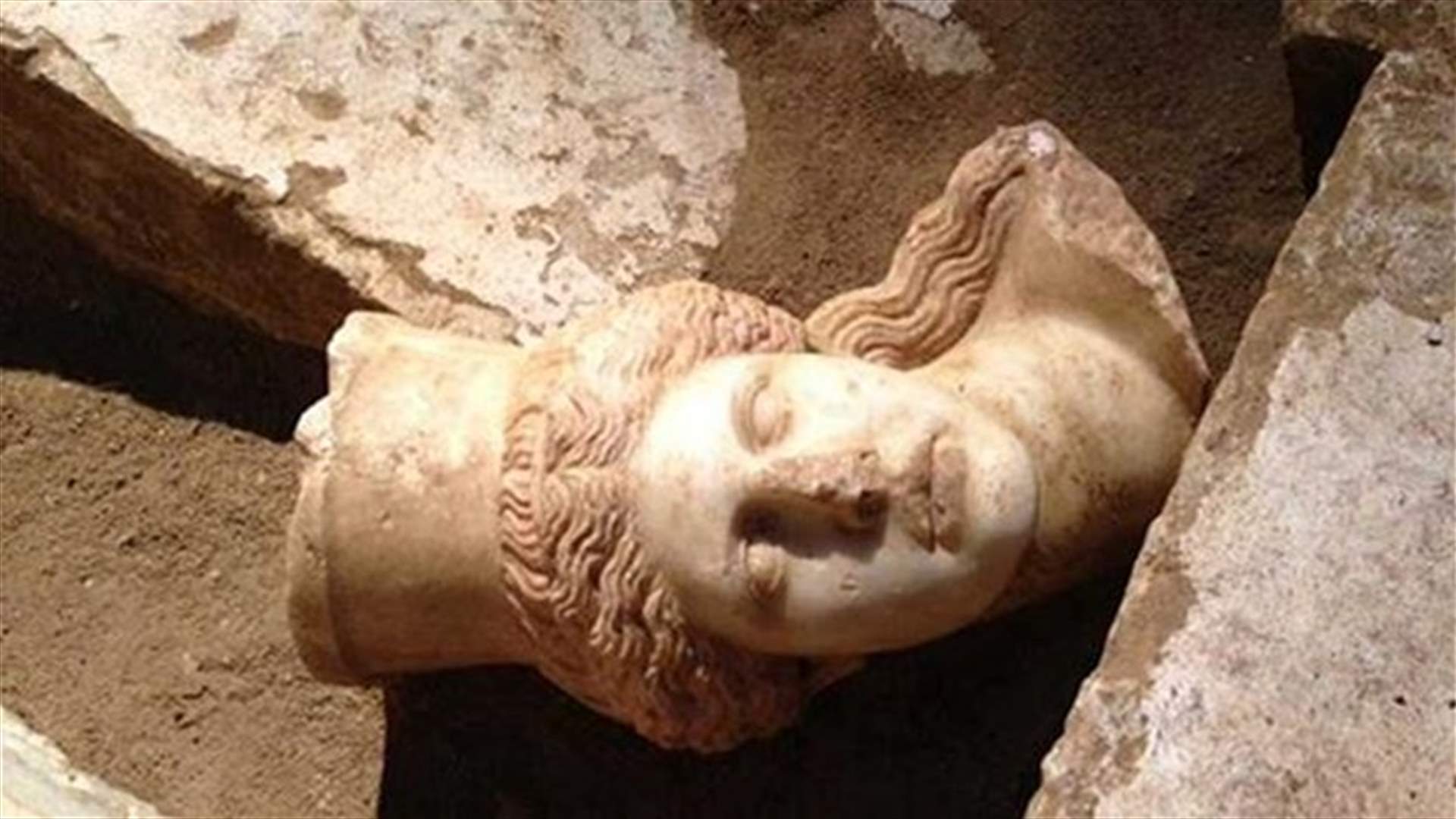 Greek archaeologists unearth head of sphinx in Macedonian tomb