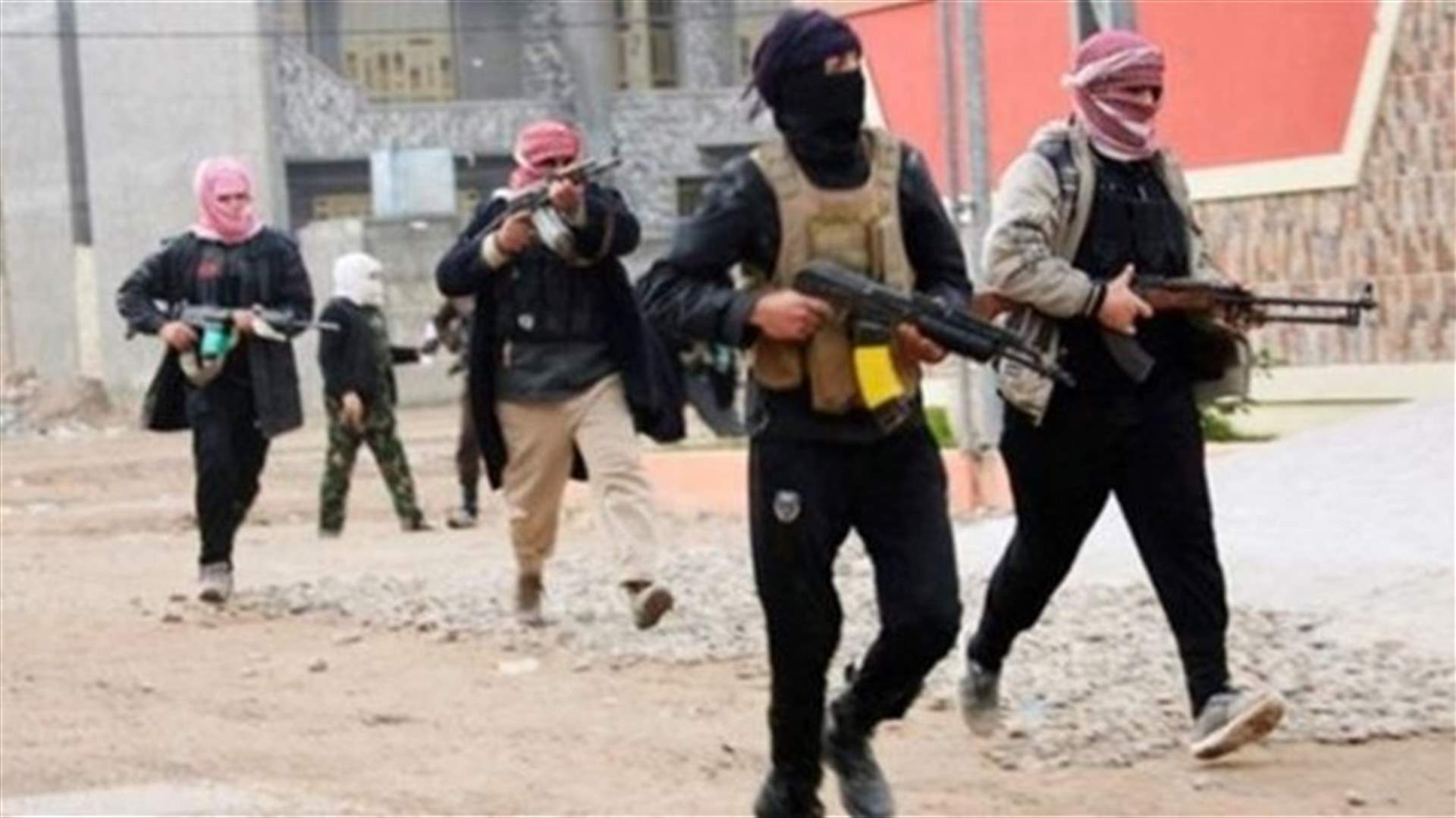 Iraq says 322 tribe members killed, many bodies dumped in well