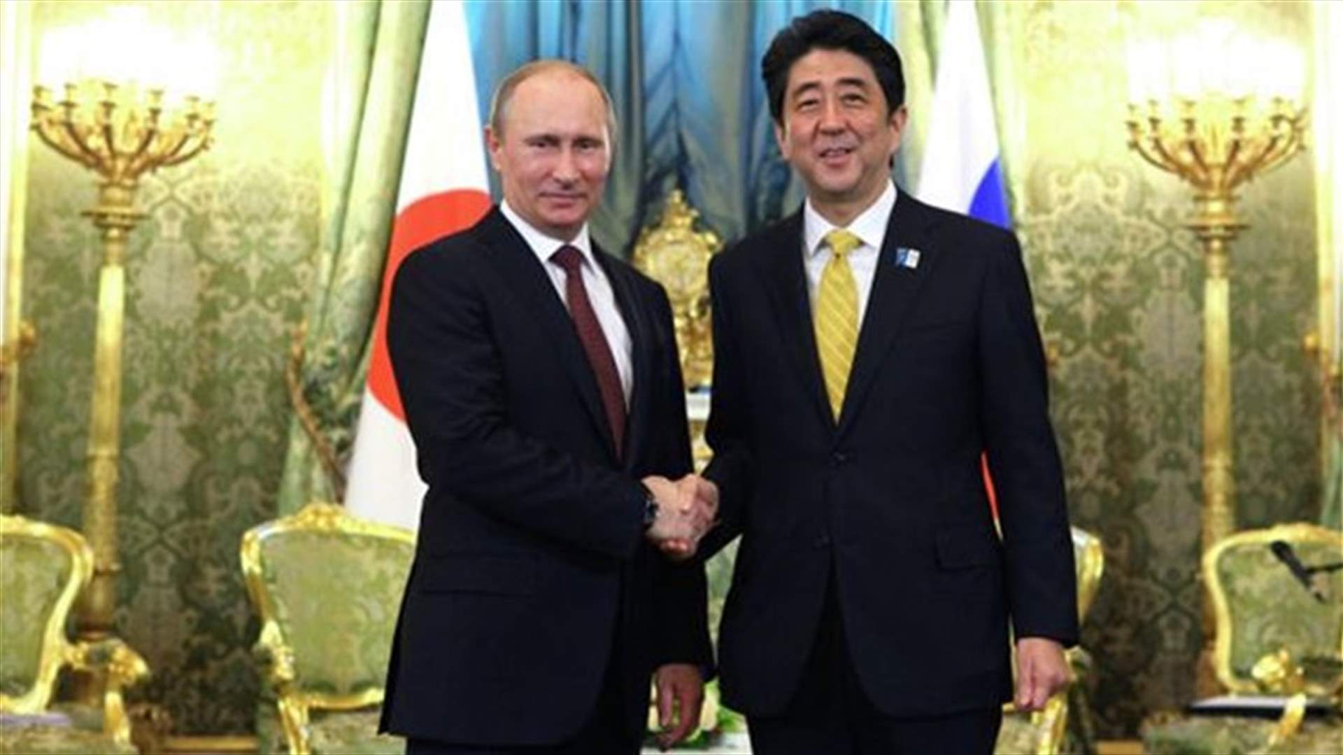 Japan's Abe urges Putin to ensure Ukraine ceasefire holds