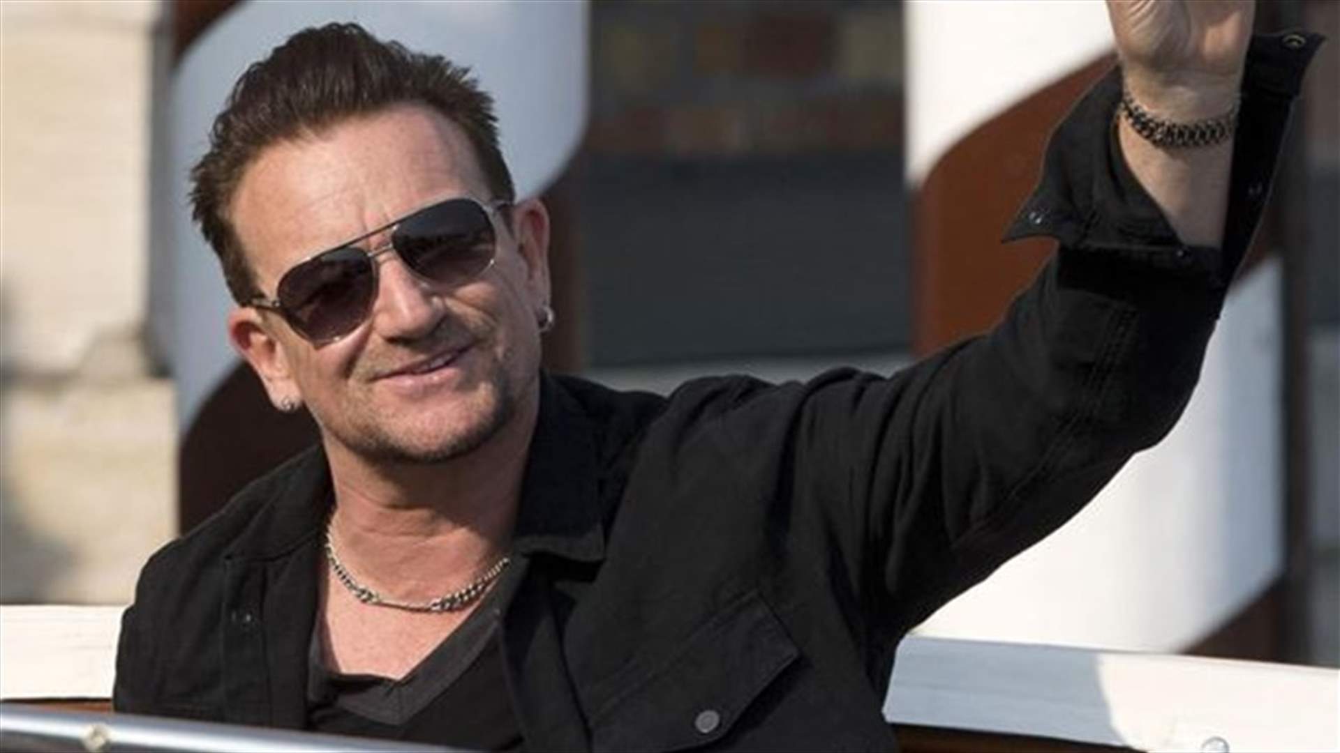 Bono's plane loses hatch before landing in Berlin