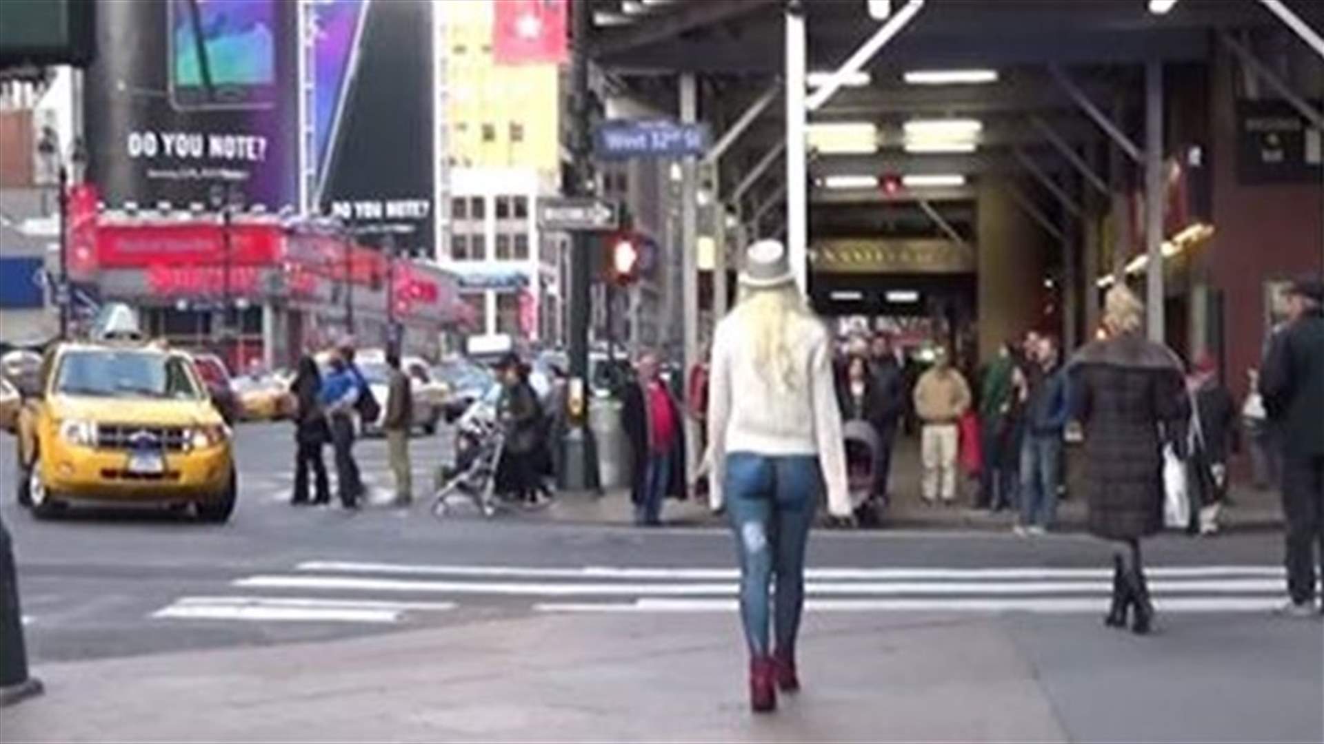 [VIDEO] Girl Roams Streets Almost Naked, No One Notices
