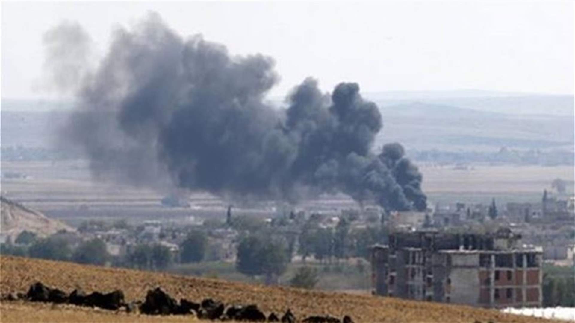 Islamic State suicide bombers target Syrian border town Kobani