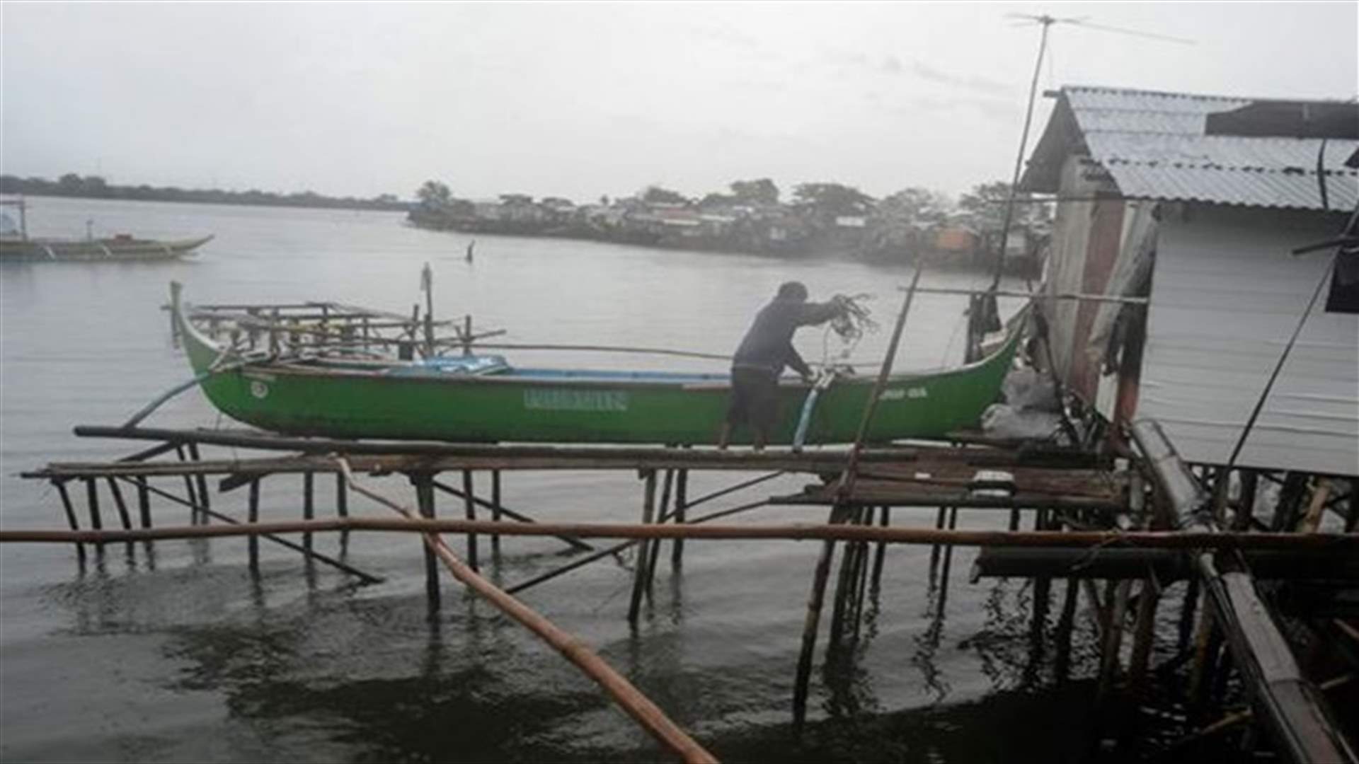 Philippine rescuers struggle to reach villages after typhoon "folded homes like paper"