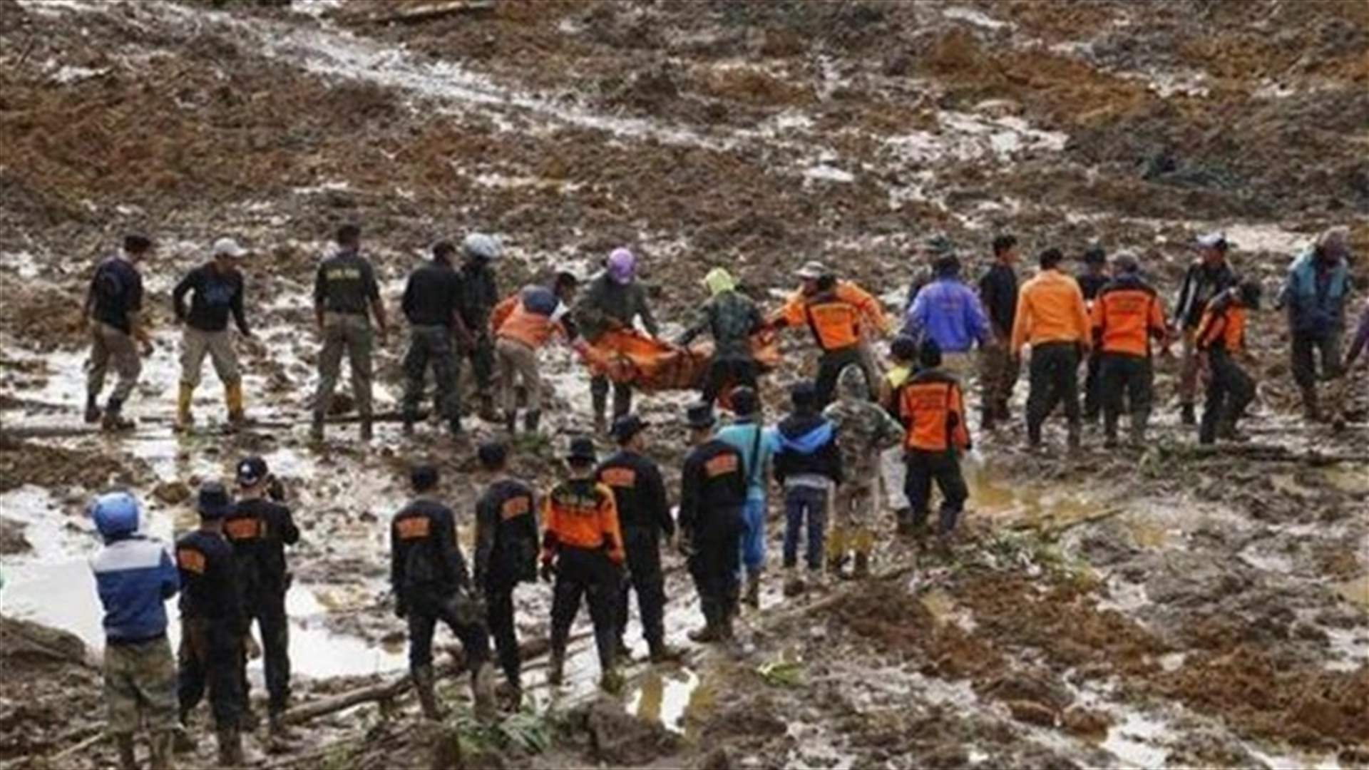 Indonesia rescuers use earth-movers in landslide rescue as toll rises to 24
