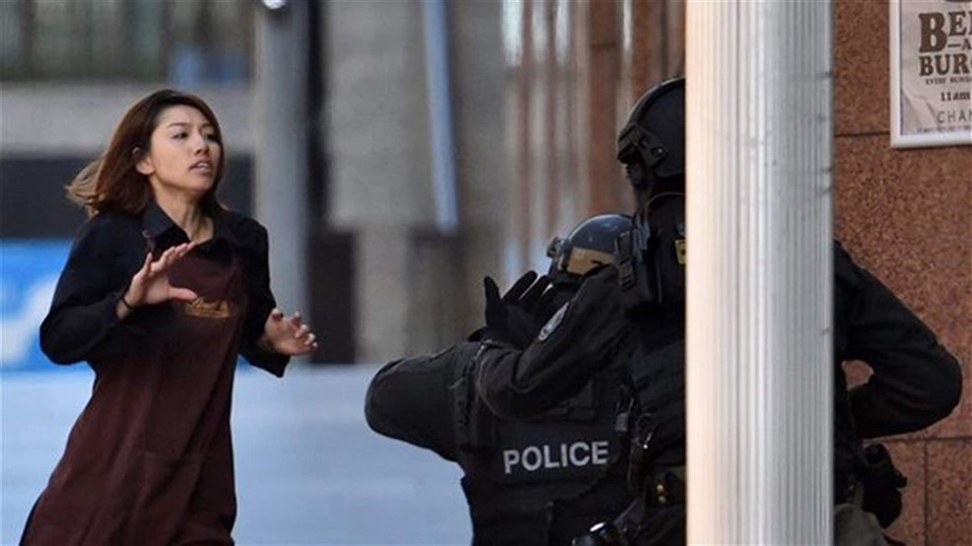 Police storm Sydney cafe to end hostage siege, three dead