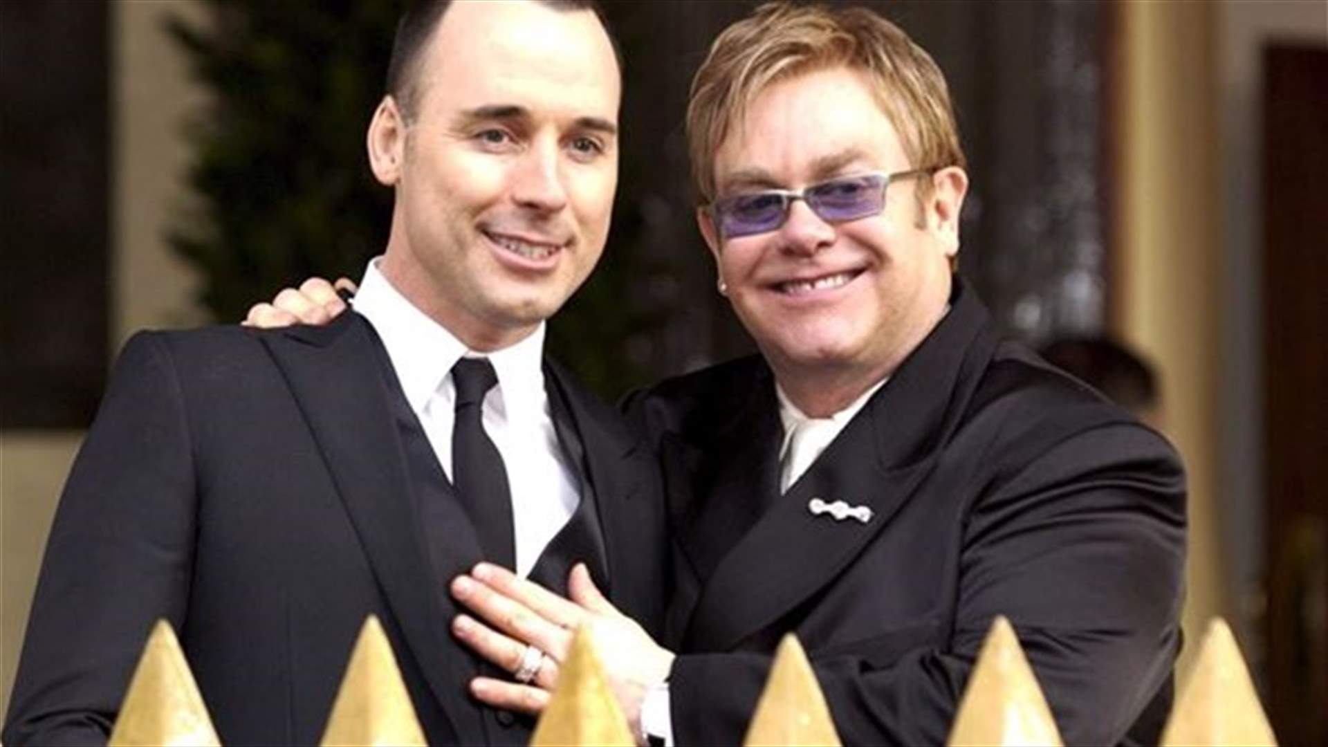 Gay British musician Elton John marries partner under new law