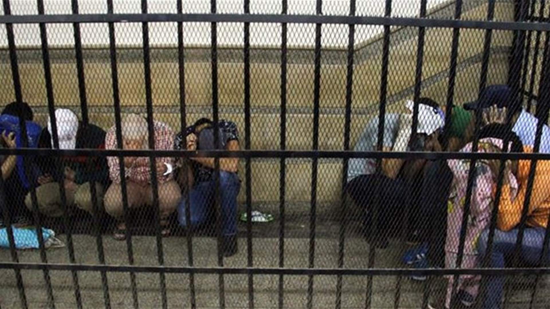 Egypt reduces sentence for eight men over gay marriage video