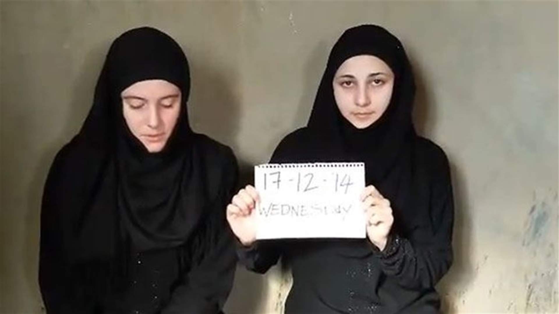 Video purports to show two Italians held by Syria captors