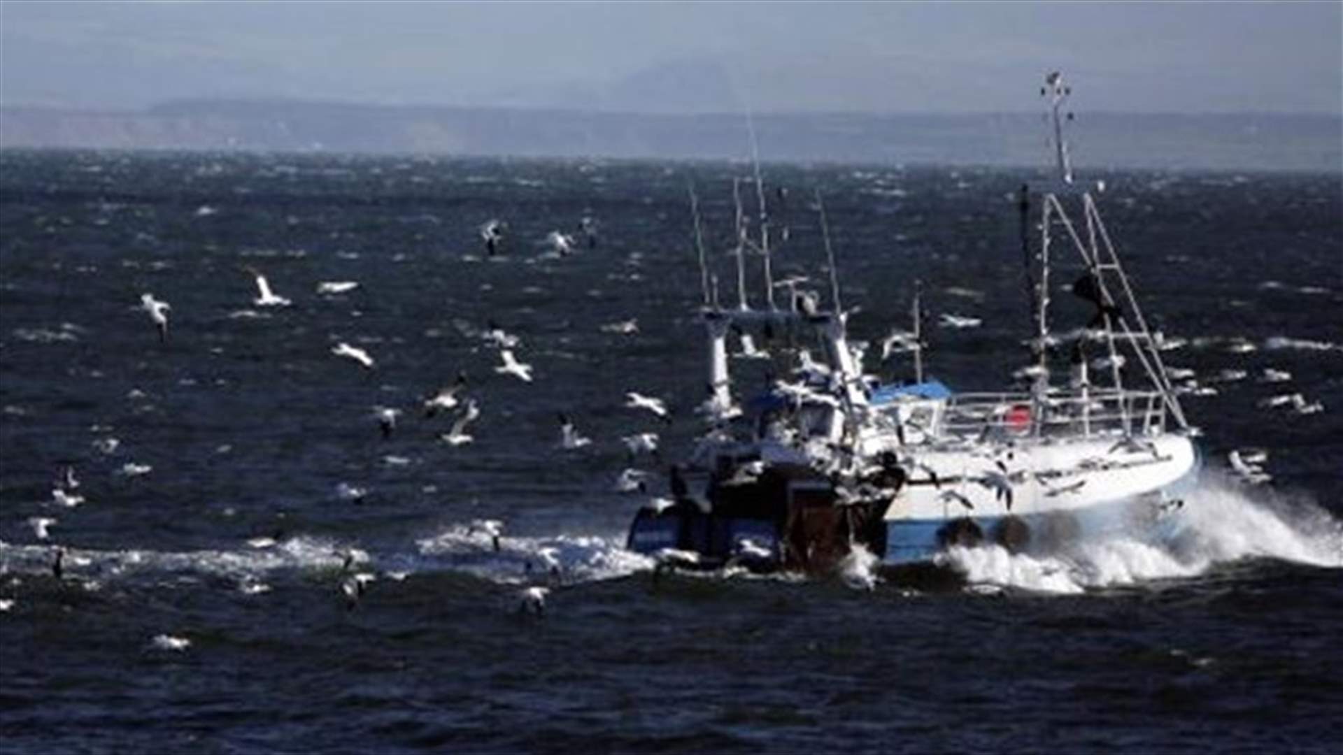 Eight crew missing after cargo ship capsizes off Scotland