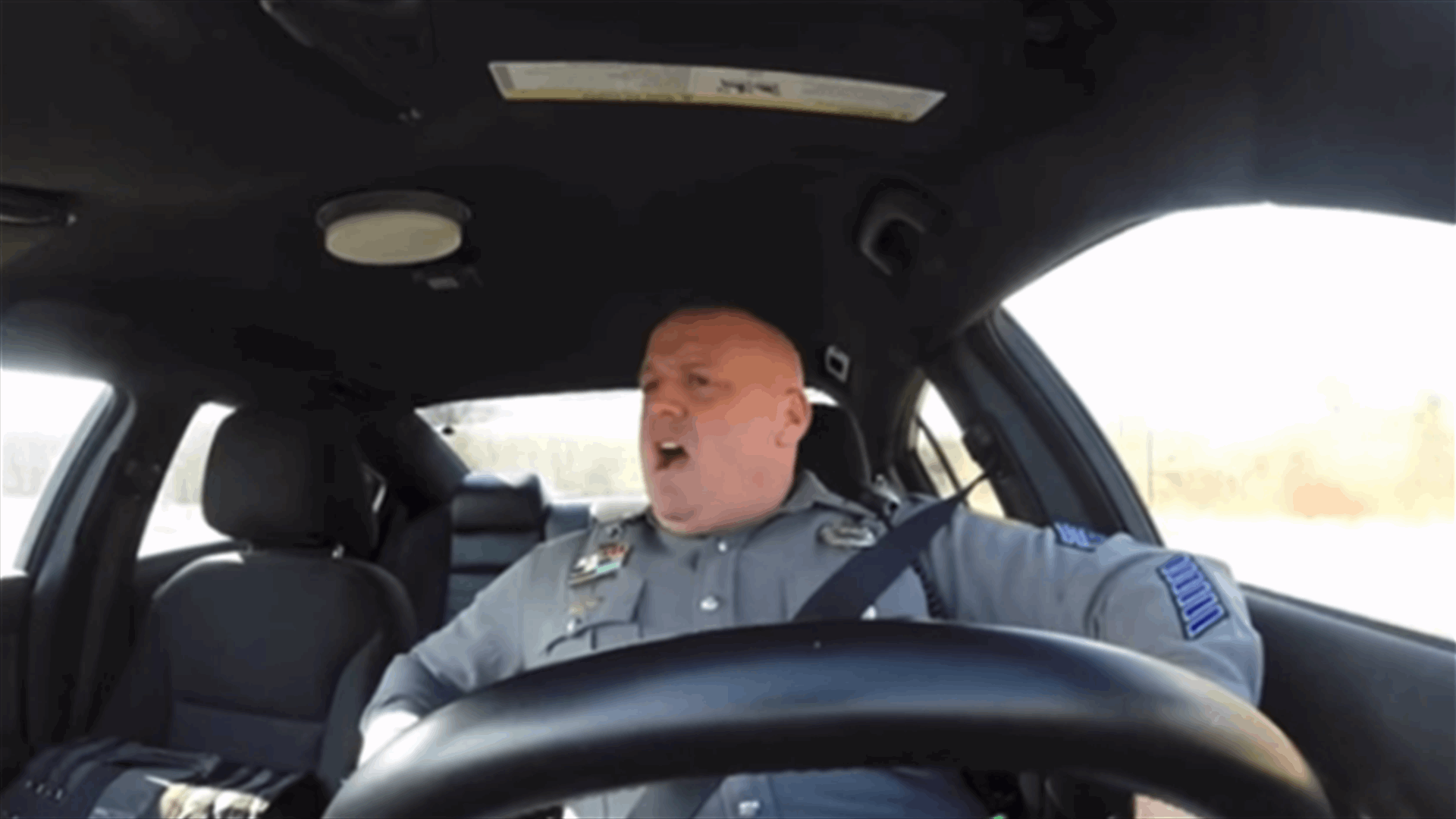Hilarious! Police Officer Caught Dancing To Shake It Off
