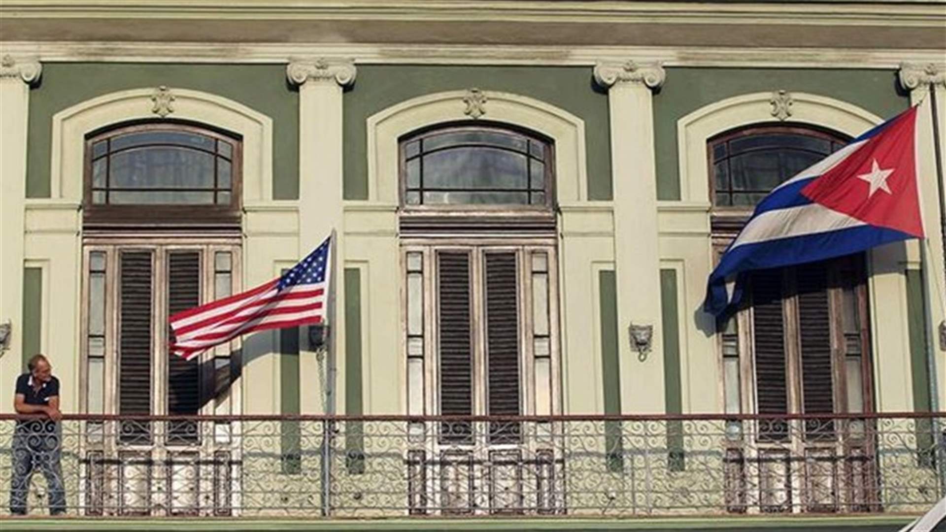 Havana talks start after promises by Obama, Cuban caution