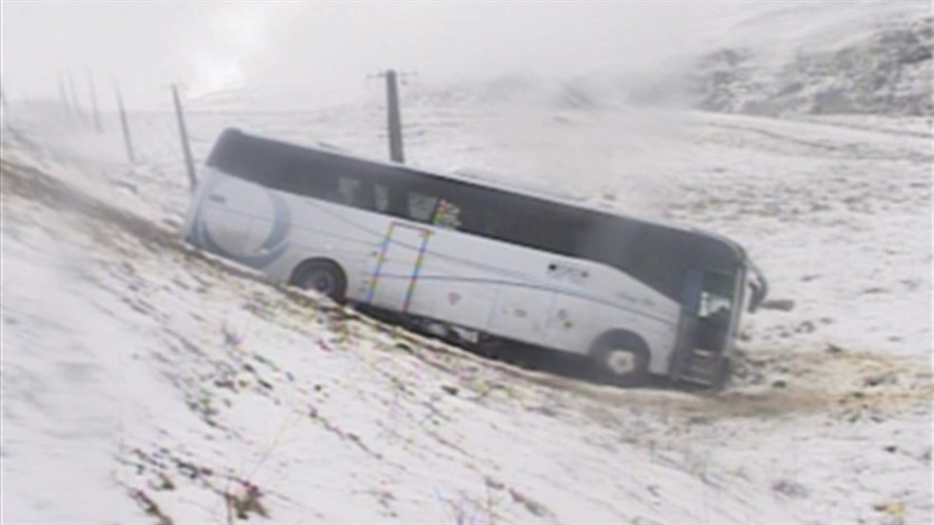 46 passengers have brush with death in freak bus accident in Dahr al-Baidar