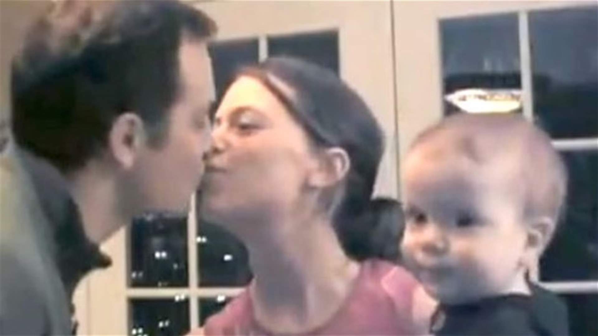 [VIDEO] Watch This Baby's Jealous Reaction To Father Kissing Mother!