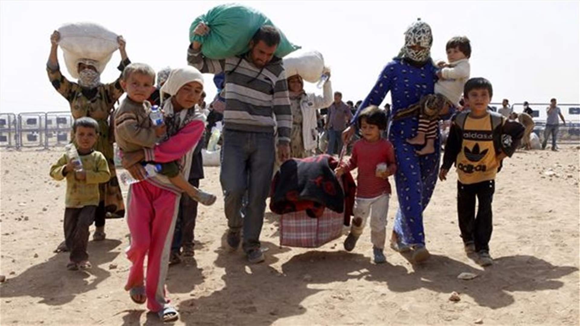 Syrians slowly return to Kobani after Kurds win back border town