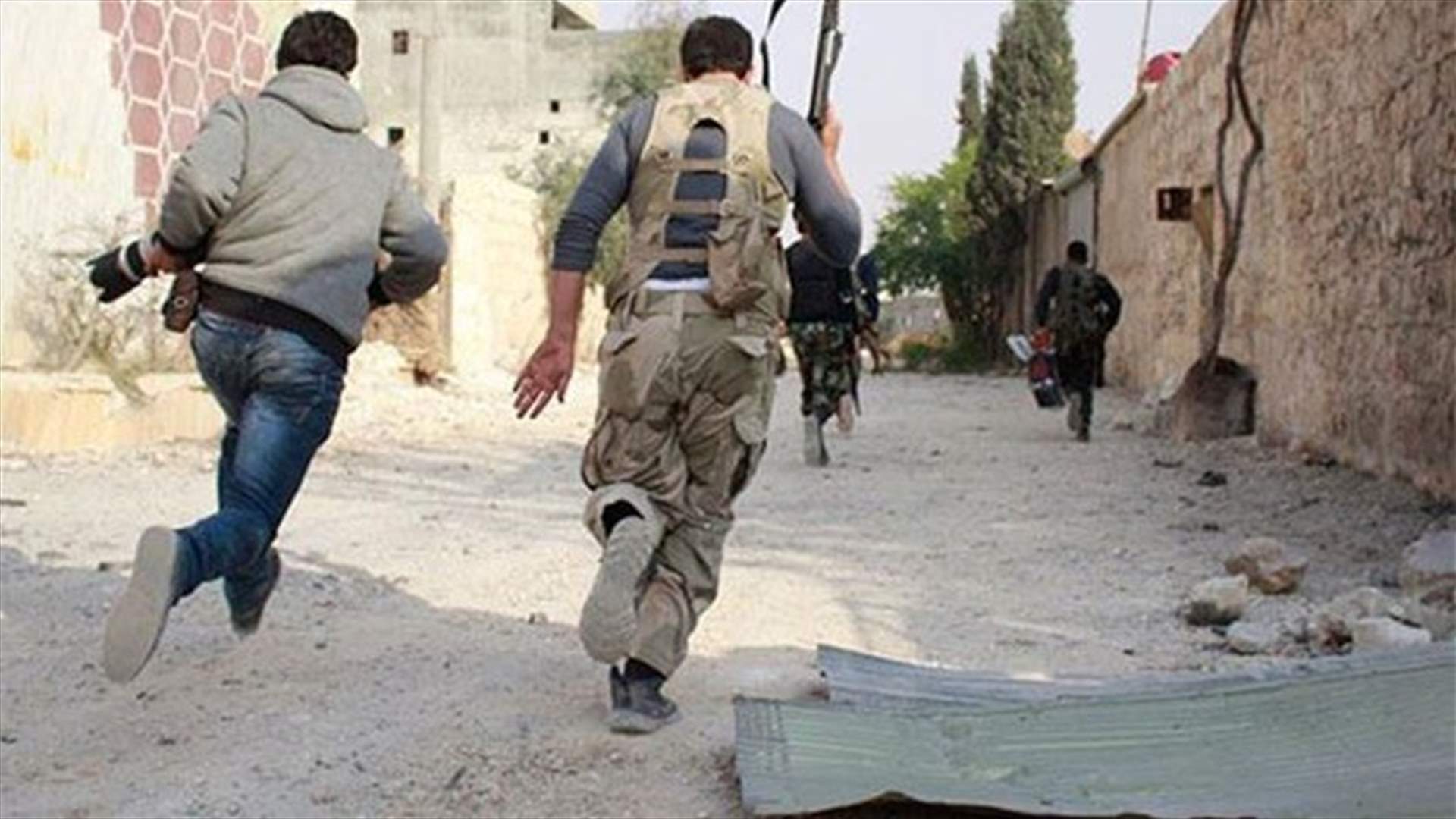 Activists: Syrian barrel bombs kill at least 10 in Aleppo