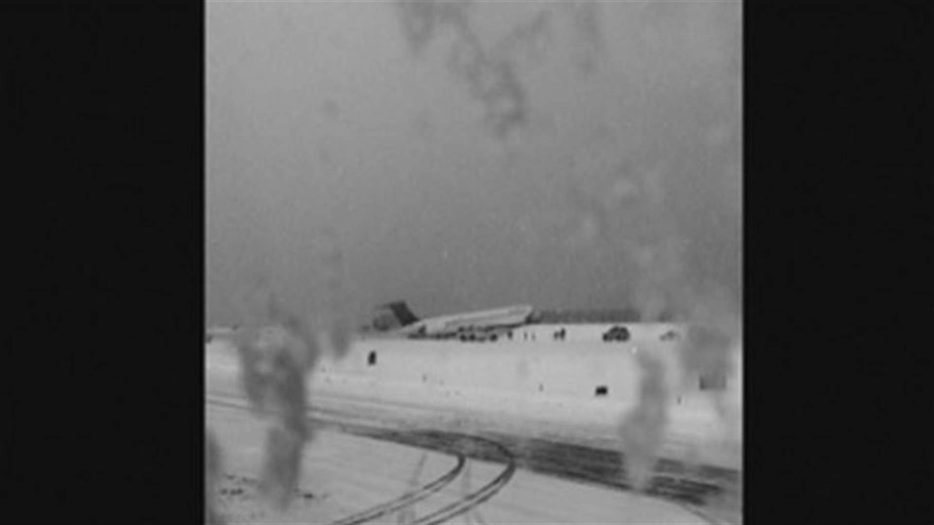 Plane skids off runway at LaGuardia, crashes through fence