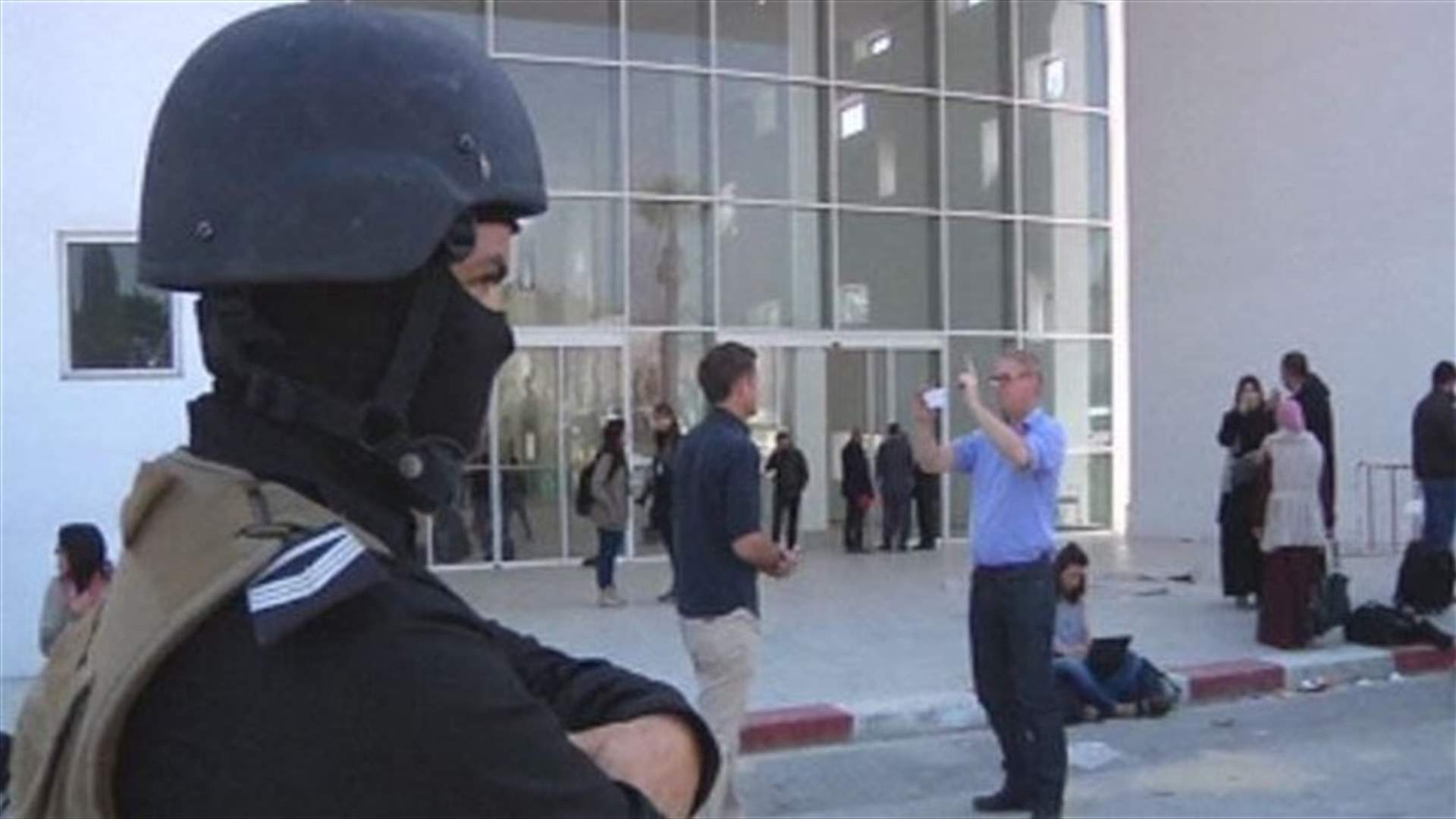 Tunisian president says third museum gunman on the run