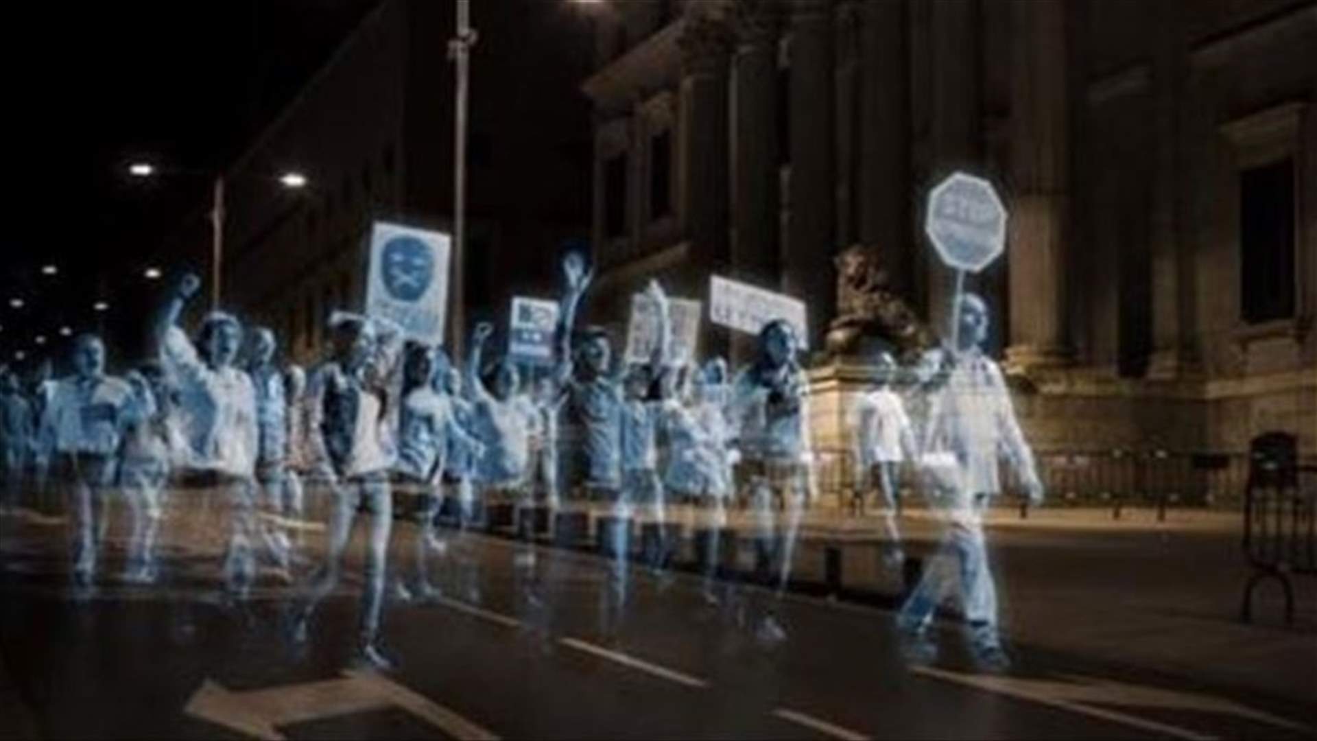 [VIDEO] 'Ghost' Protest Before Spanish Parliament