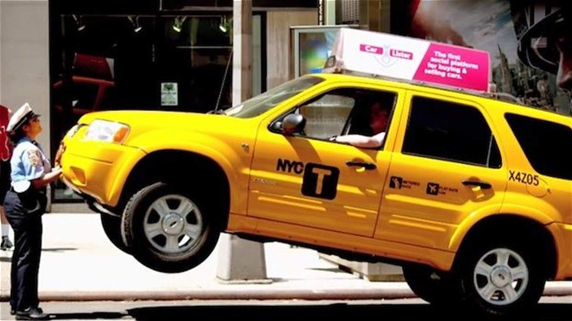 [VIDEO] Female Cop Lifts Taxi Off Ground In Jaw-Dropping Scenery!