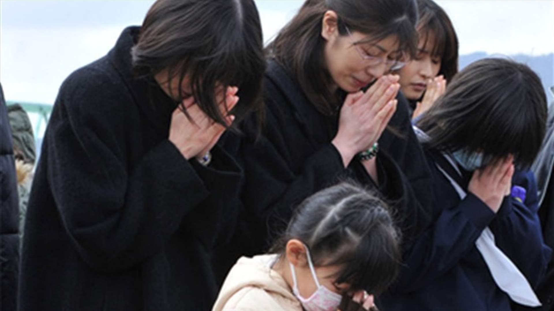 Japan mourns tsunami dead; grapples with aftermath