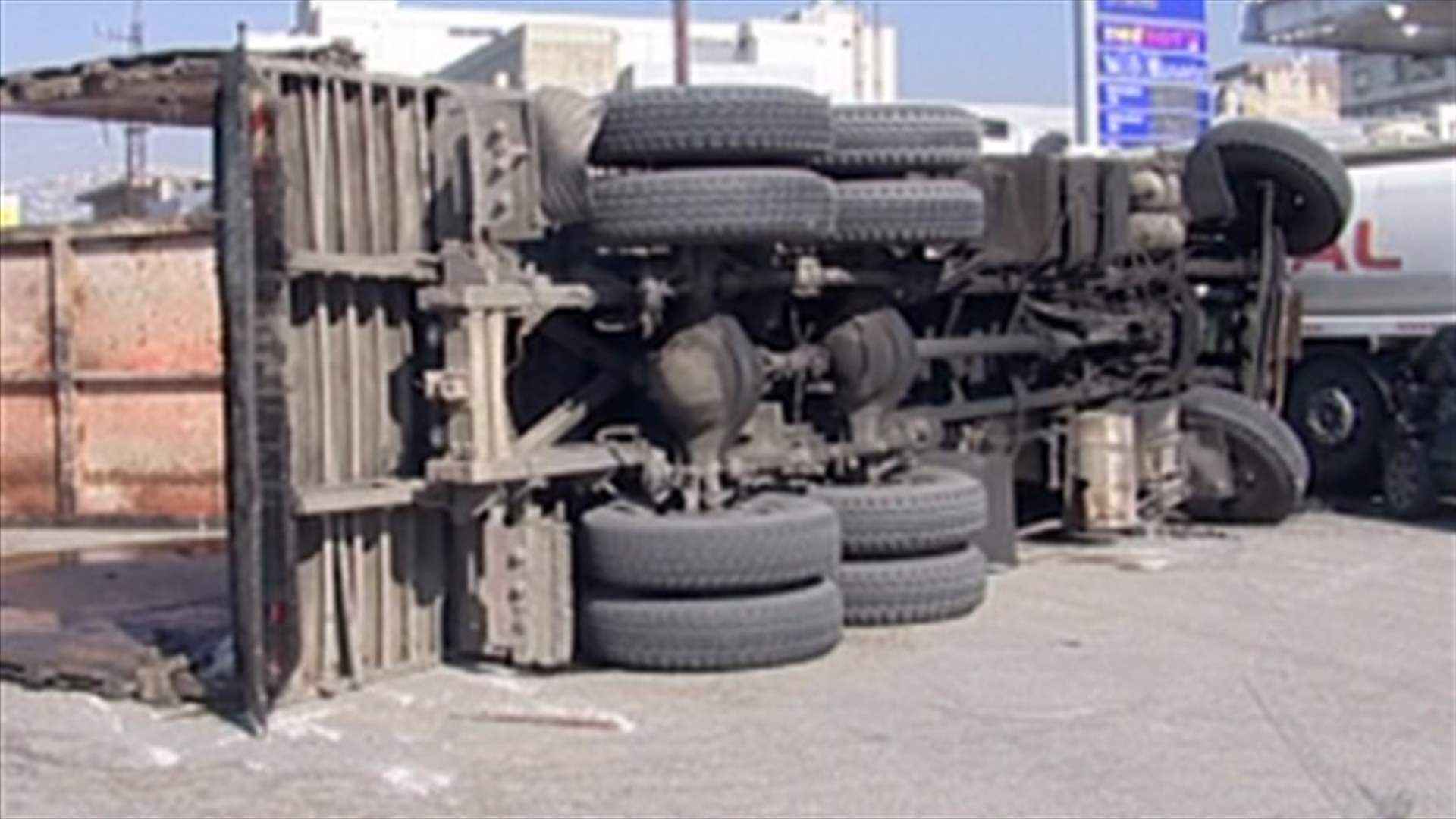 Dbayeh coastal road blocked for hours after overturned truck crushes car