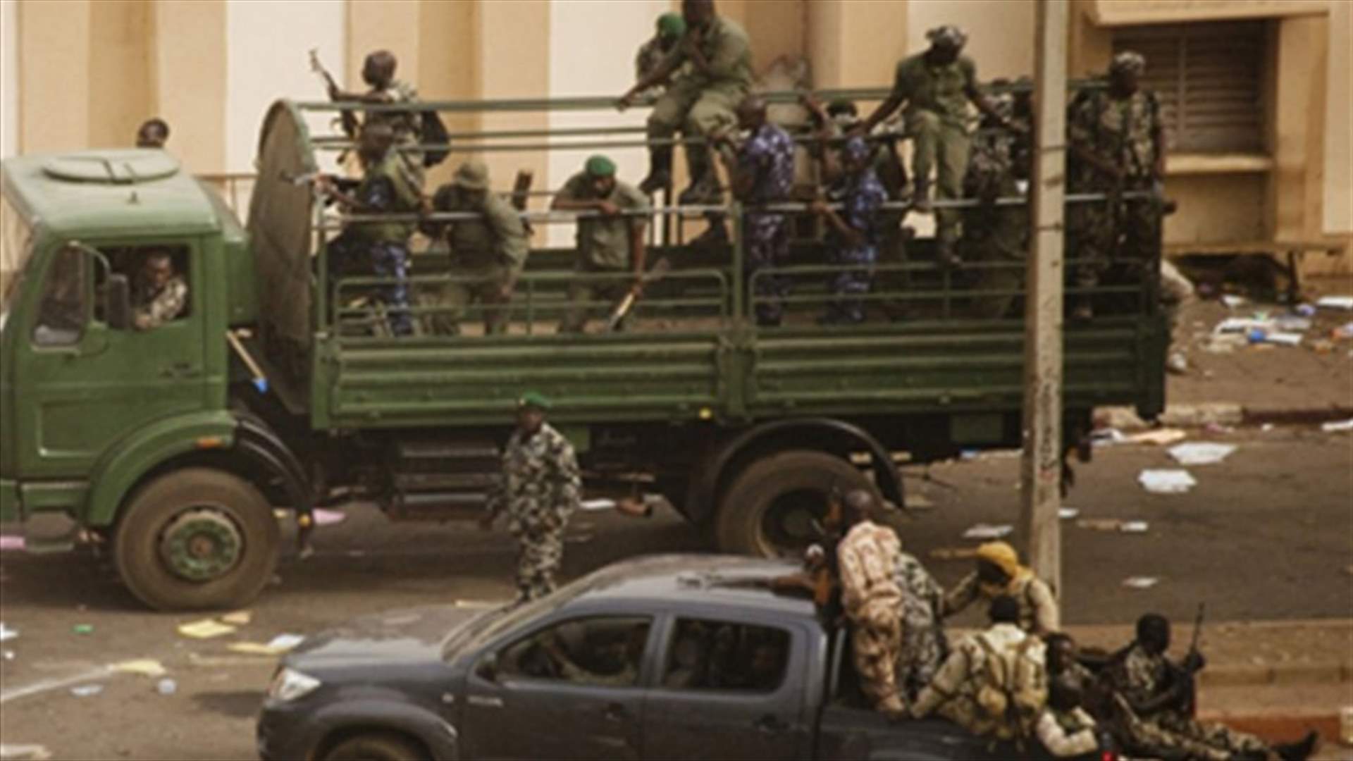 Mali junta claims control of state TV, fighting continues