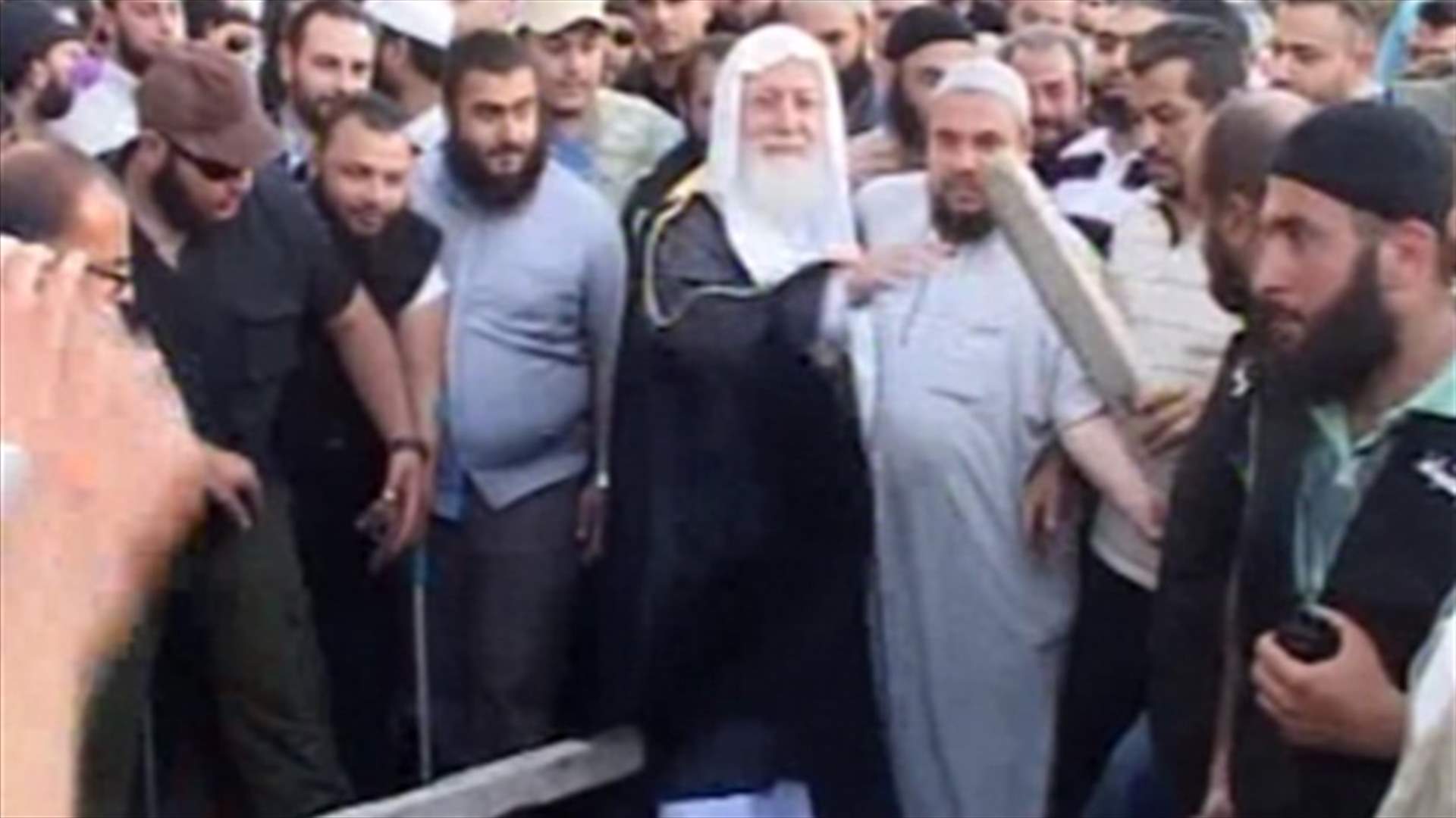 Tension eases in Tripoli, roads reopened